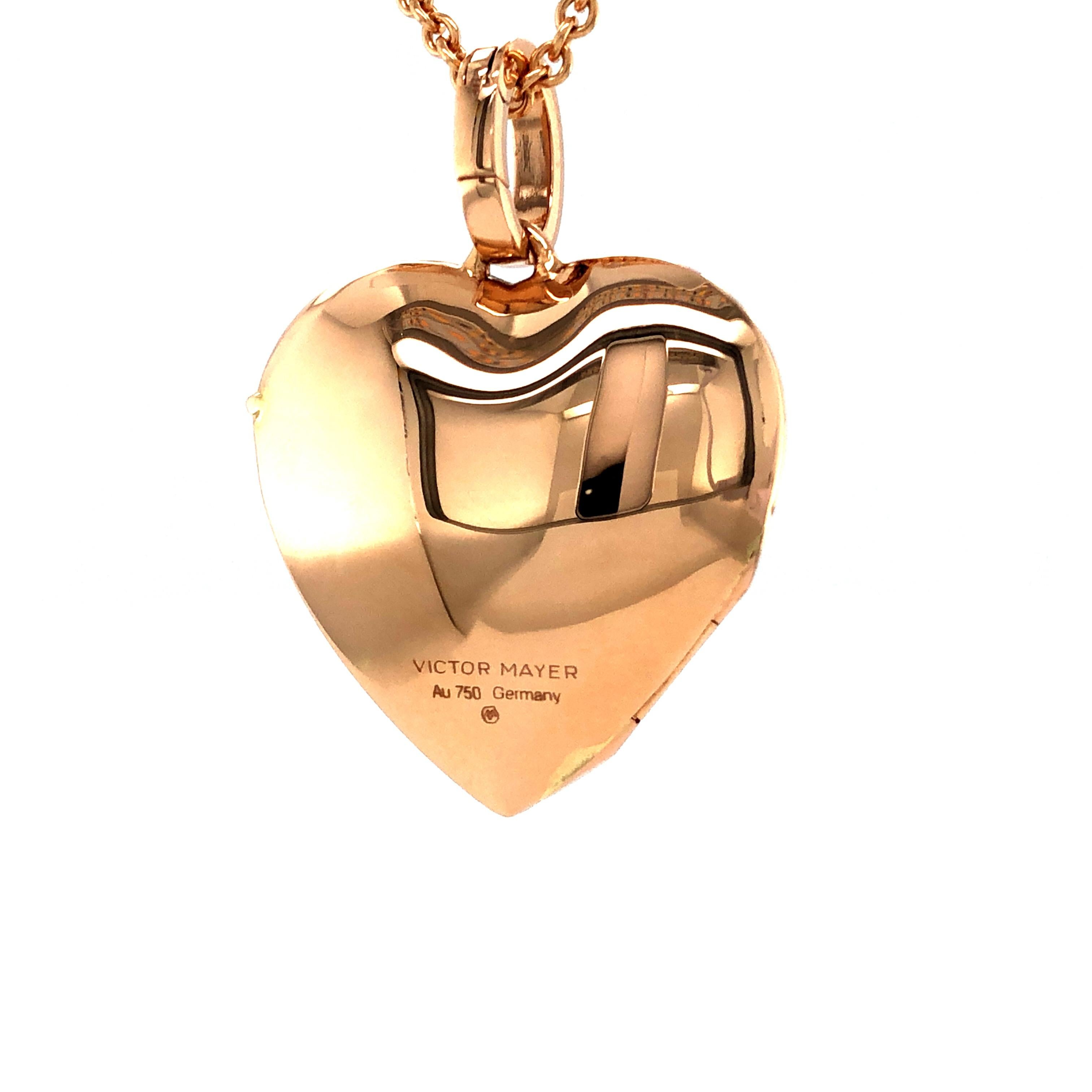 Victor Mayer customizable heart shaped polished pendant locket 18k rose gold, Hallmark collection, measurements app. 25 mm x 25 mm

About the creator Victor Mayer
Victor Mayer is internationally renowned for elegant timeless designs and unrivalled