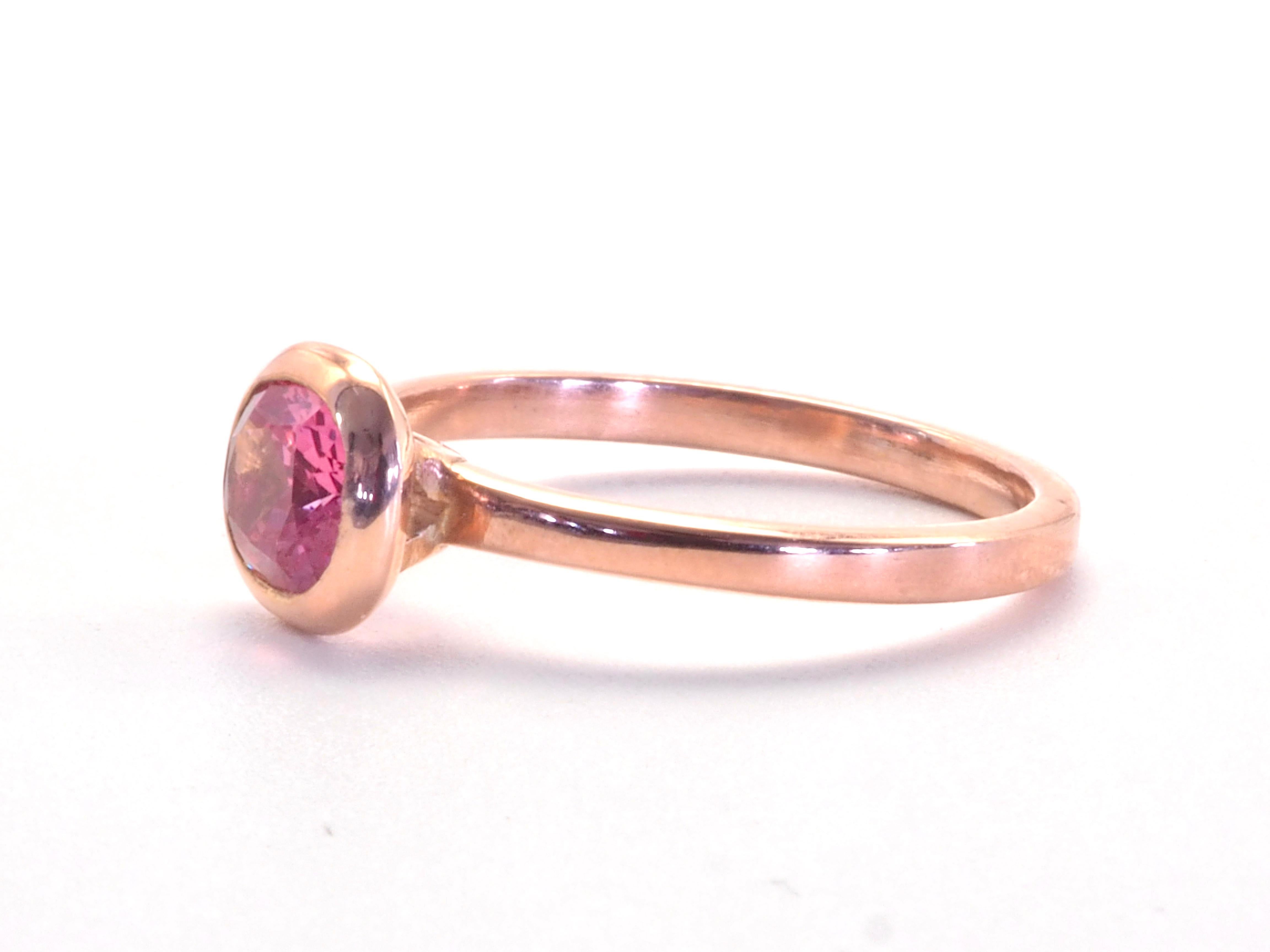 For those who loves all pink!

This beautiful and modern solitaire engagement ring boasts a very stunning 0.73 carats clear and sparkling with unbeatable luster oval mahenge pink spinel as the main stone! The pinkiness is enhanced by the rose gold.