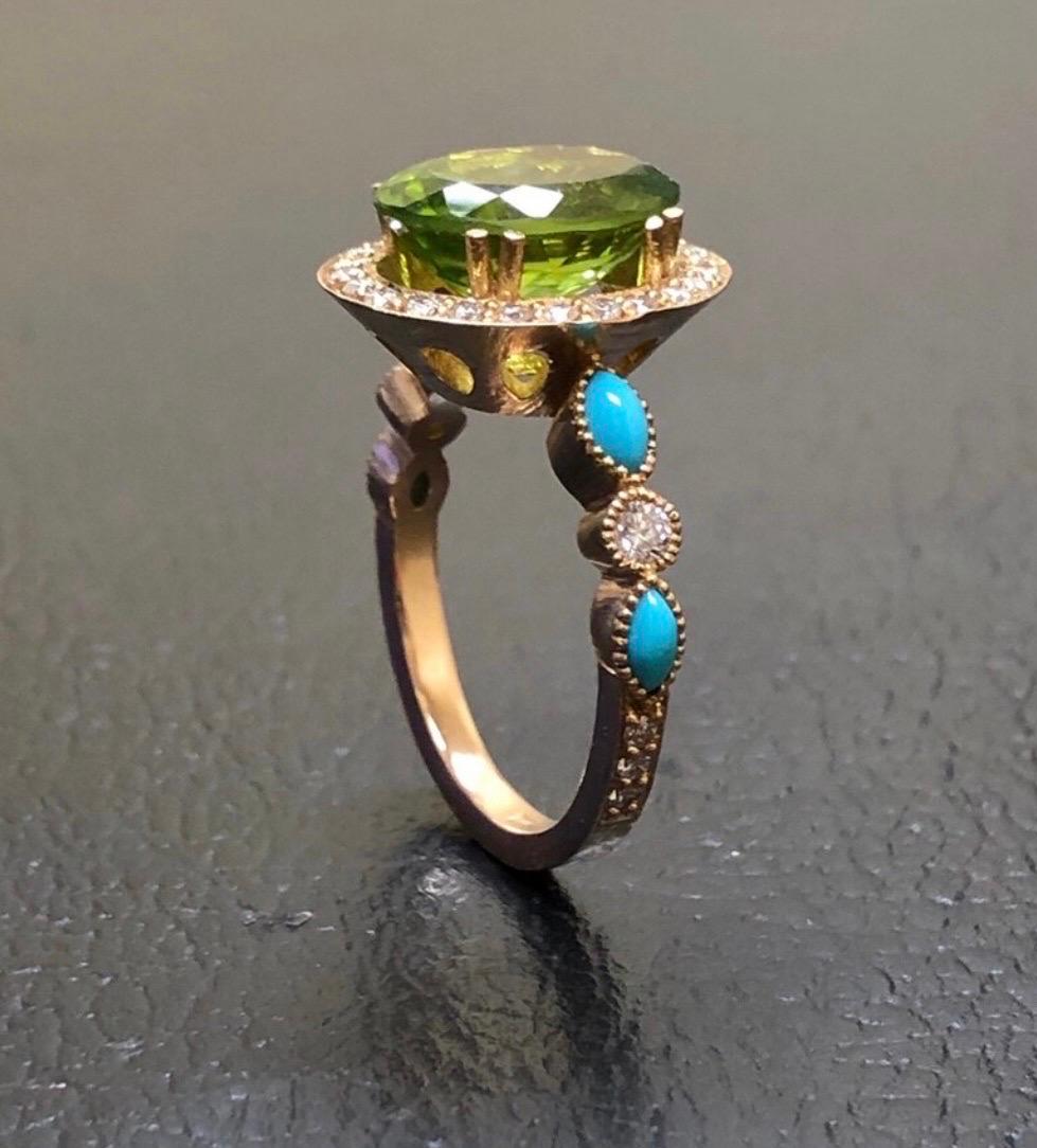 DeKara Designs Collection

Metal- 18K Rose Gold, .750.

Stones- Center Features a Genuine Green Peridot 4.15-4.30 Carats, 12 x 10 MM. Four Marquise Turquoise, 32 Round Diamonds F-G Color VS2 Clarity, 0.40 Carats.

Size- 4-12

Beautiful Handmade Art