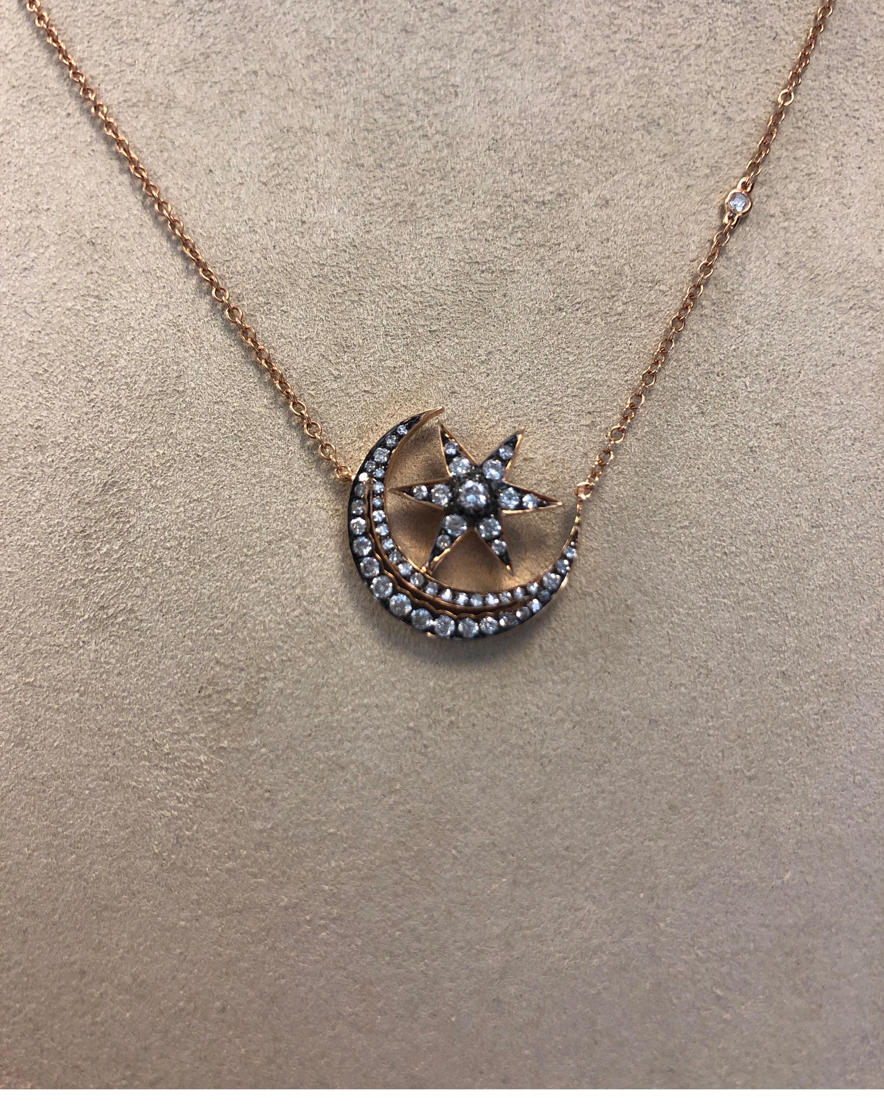 18K rose gold necklace, by SHAY, with half moon and star, channel and prong set with diamonds weighing .58cts, length 17 inches.
last retail $3150