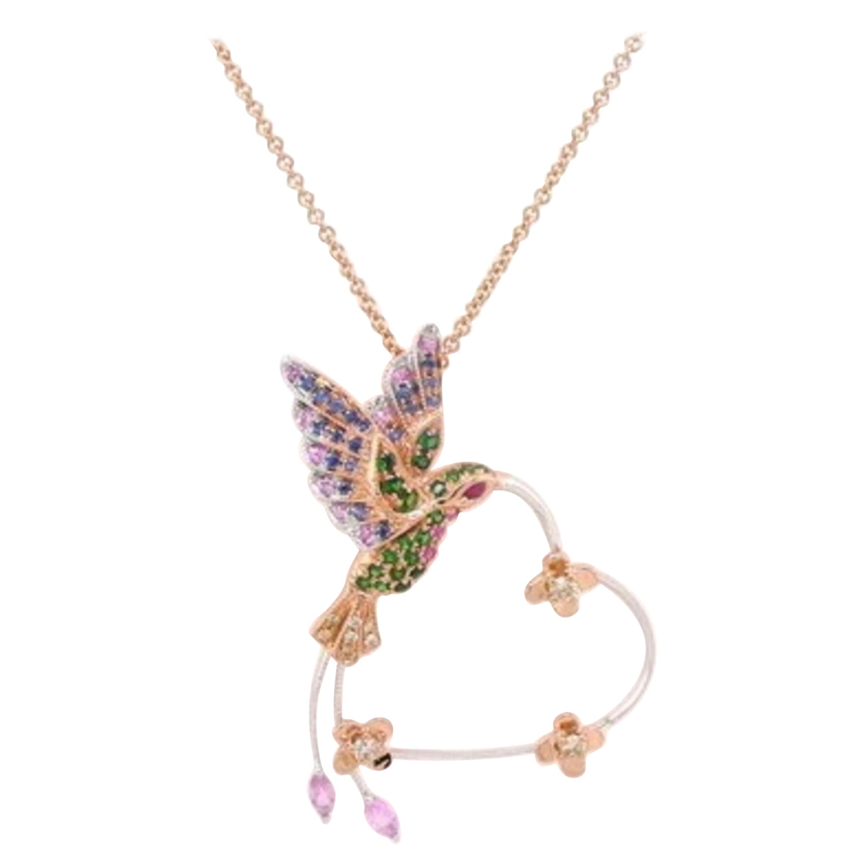 18K Rose Gold Multi-Colour Sapphire Humming Bird & Heart Necklace with Diamonds

19 Blue Sapphires - 0.09 CT
2 Diamonds - 0.03 CT
10 Fancy Diamonds - 0.12 CT
20 Green Garnets - 0.19 CT
2 Pinke Sapphires - 0.17 CT
13 Rubies - 0.11 CT
18K Gold - 5.78