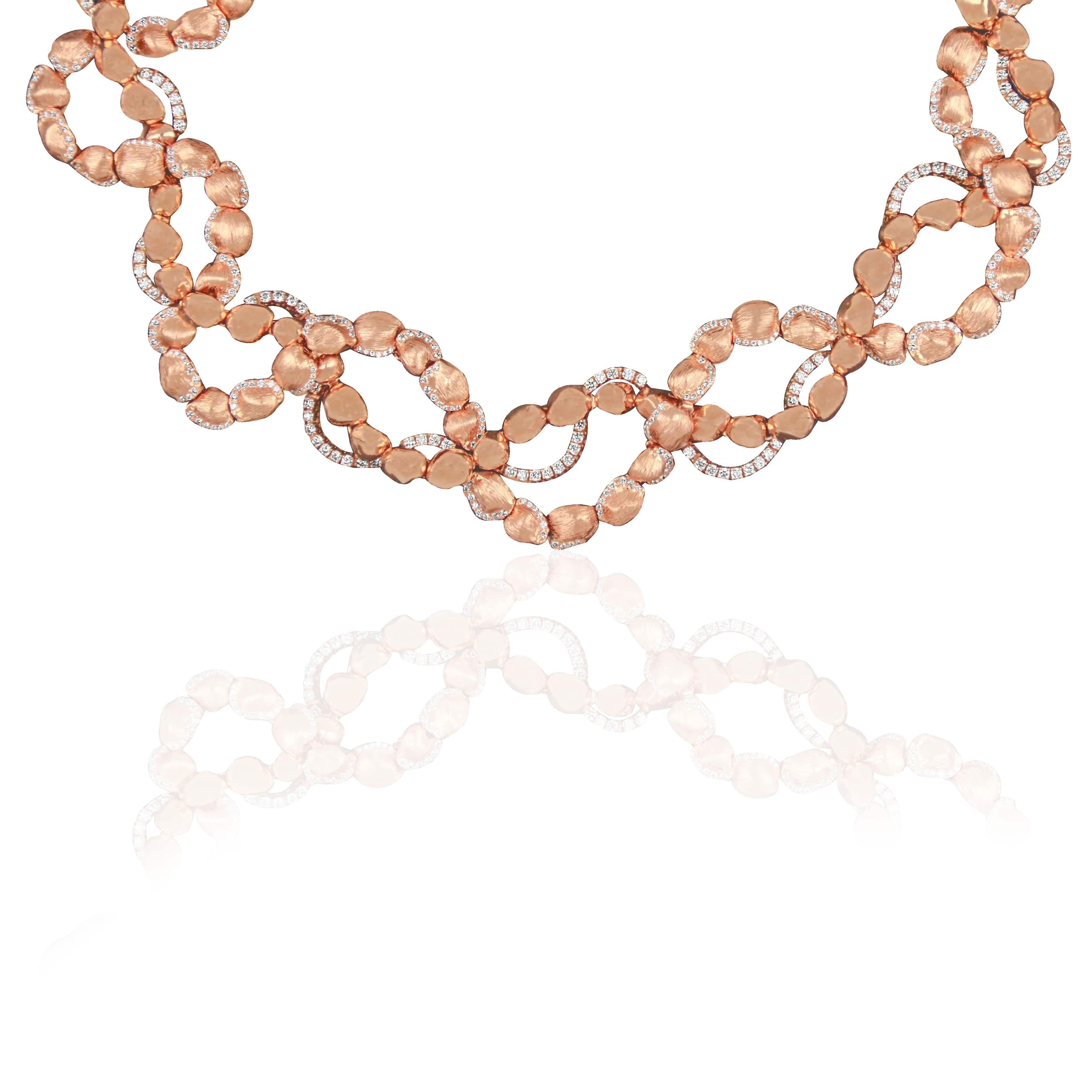 Sarab Collection Statement Necklace takes its shape from the patterns and marking of the desert. Interlacing the finest round cut diamonds and rose gold shiny and matte nuggets to create an echo of the many stories of resilient women of the