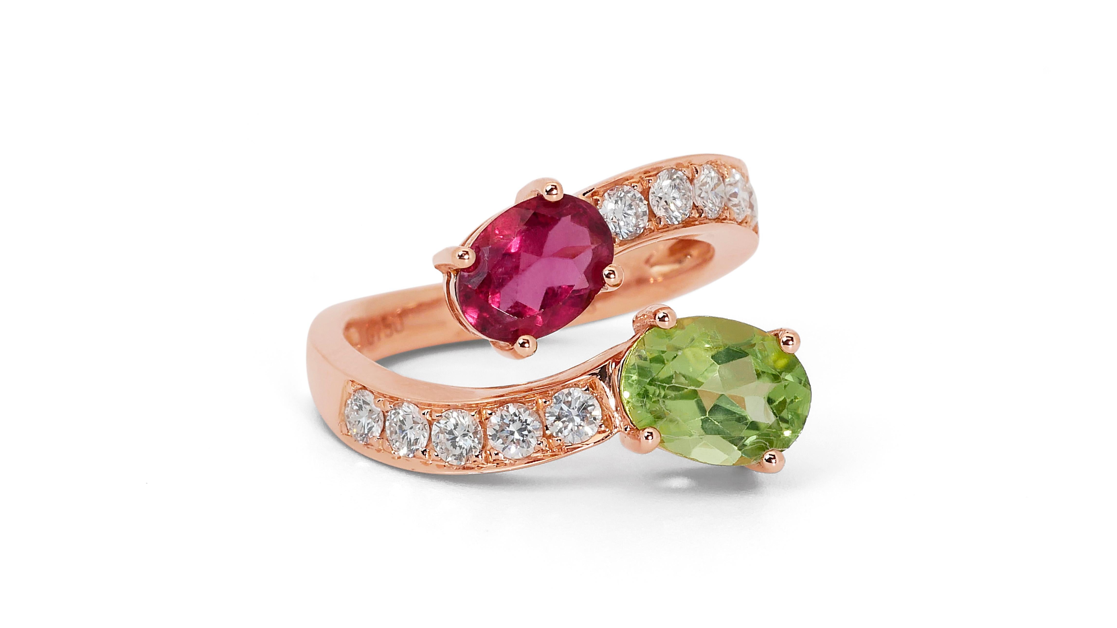 A one-of-a-kind open ring with a dazzling 1.26-carat oval mixed-cut natural peridot. It has 1.12 carats of tourmaline and diamond side stones, adding more to its elegance. The jewelry is made of 18K Pink with a high-quality polish. It comes with an
