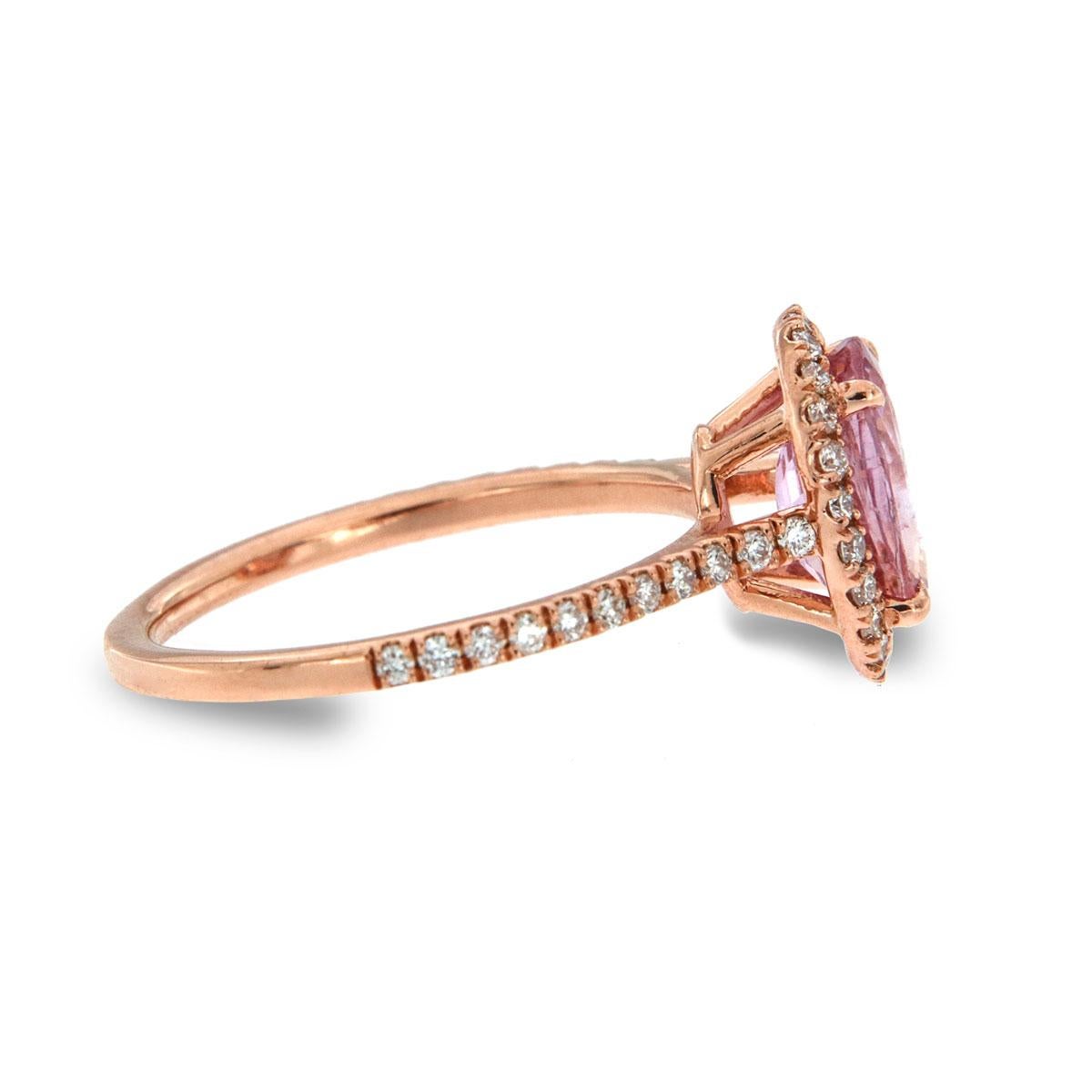 From our signature Gemstones collection of exquisite red carpet pieces, this handcrafted 18k Rose gold ring is centering a Top Quality Oval shape 2.11 Carat Sri-Lankan Pink Sapphire GIA Certificate: 2201148737 in premium luster encircled by a halo