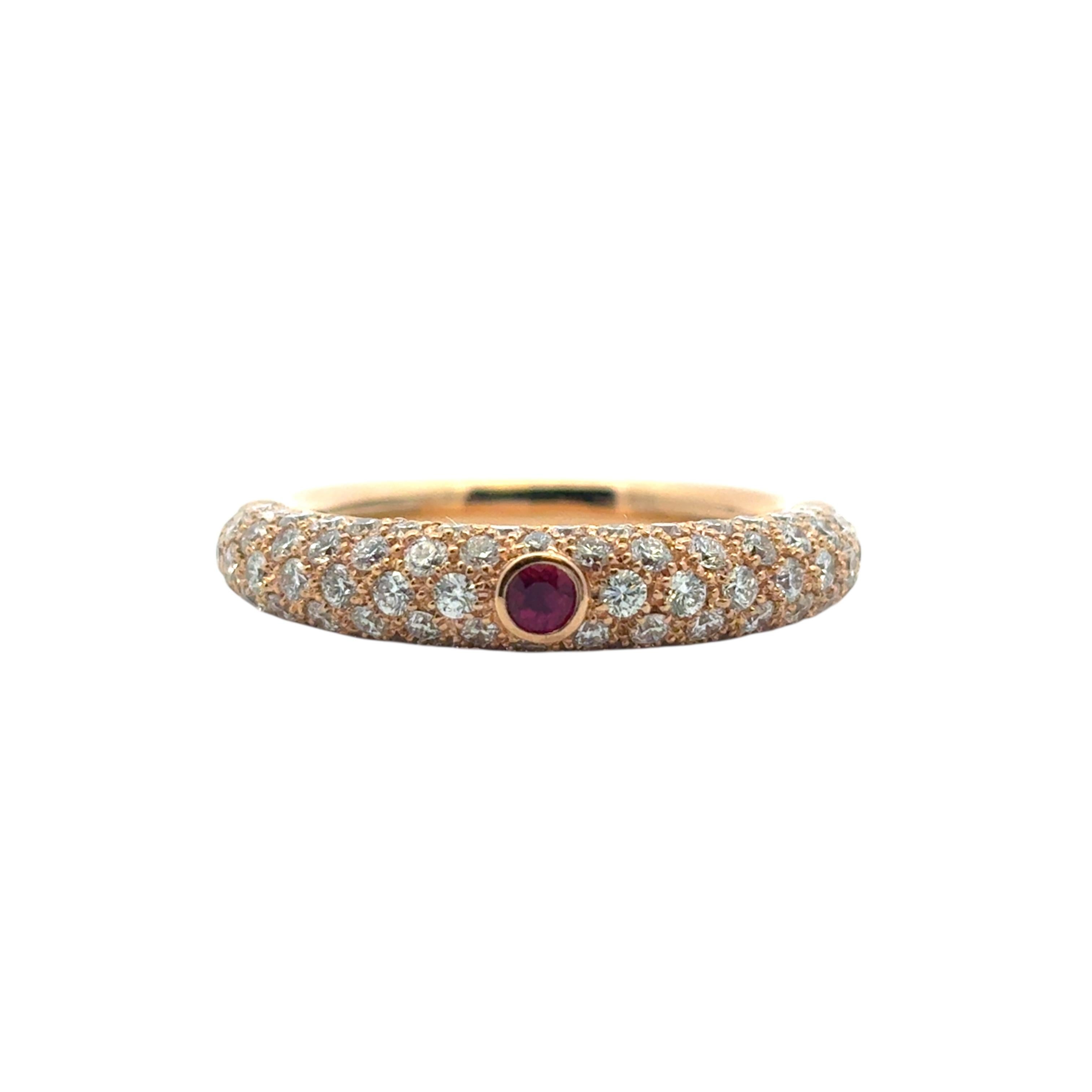 18k Rose Gold Pave Diamond with 1 Ruby Band Ring

This stunning Diamond Ruby Band Ring is in excellent condition and is ready to ship!

Style: Three Row Ruby and Diamond Wide Band
Material: 18k Rose Gold
Gemstone Details: This ring features 1 Ruby