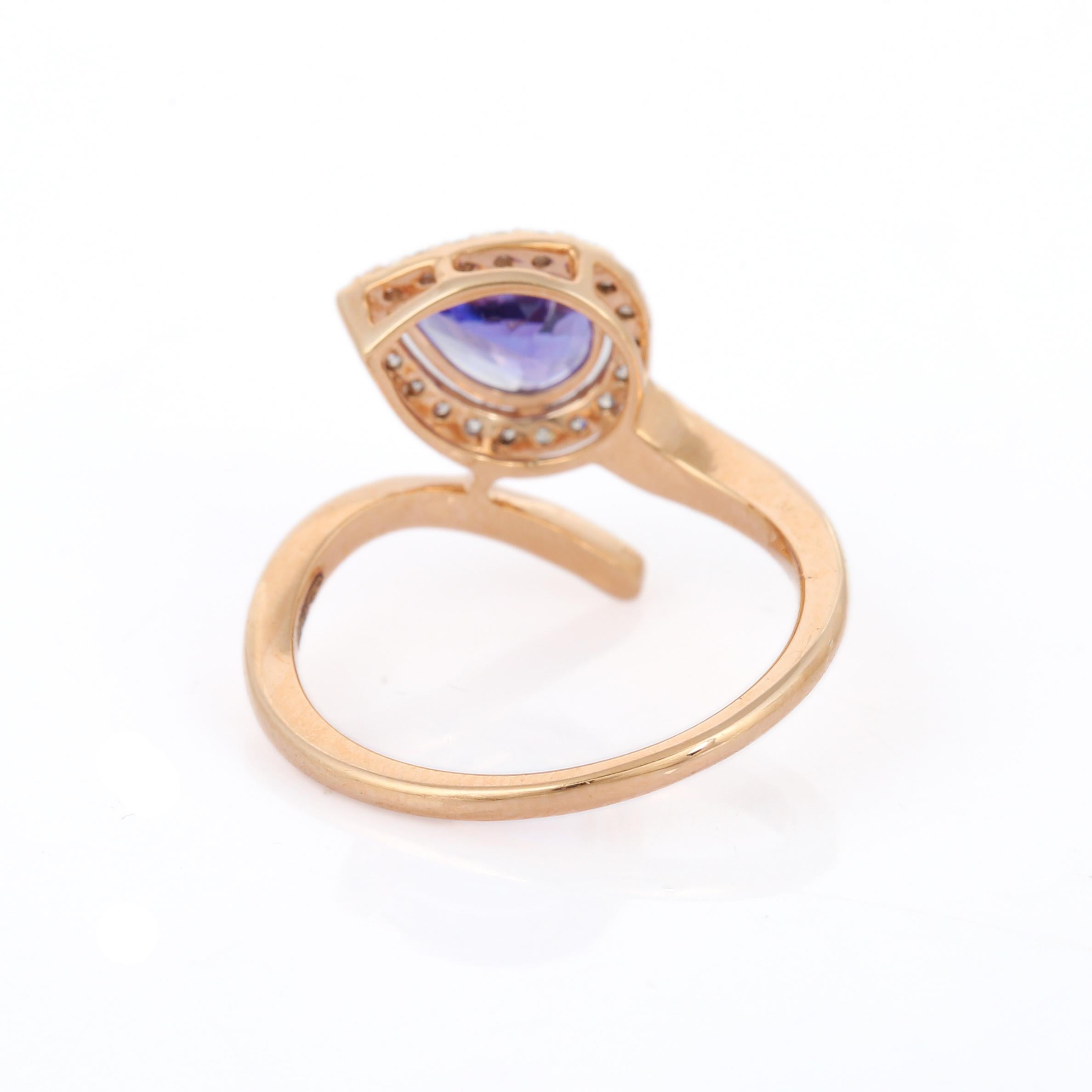 Im Angebot: Ring aus 18 Karat Roségold mit Tansanit in Birnenform und Diamant () 3