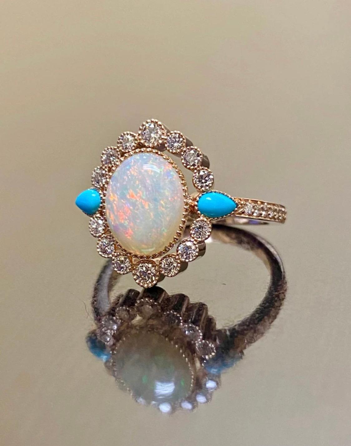 DeKara Designs Collection

Metal- 18K Rose Gold, .750.

Stones- Center Features an Oval Fiery Australian Opal 10 x 8 MM, Two Pear Shaped Sleeping Beauty Turquoise, 10 Round Sleeping Beauty Turquoise, 30 Round Diamonds F-G Color VS1 Clarity, 0.70