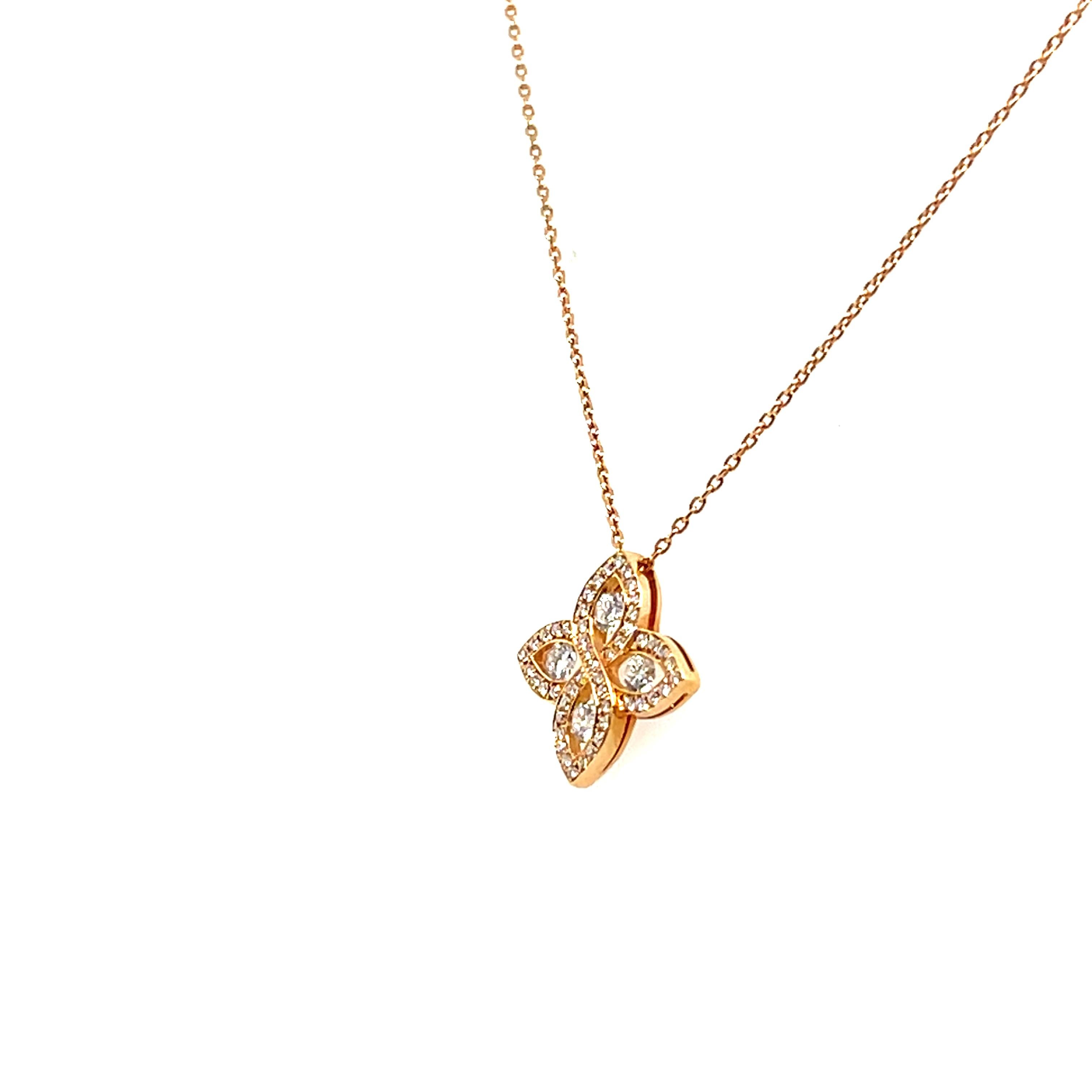 Contemporain Pendentif en or rose 18 carats à motif de fleur stylisée et diamants en vente