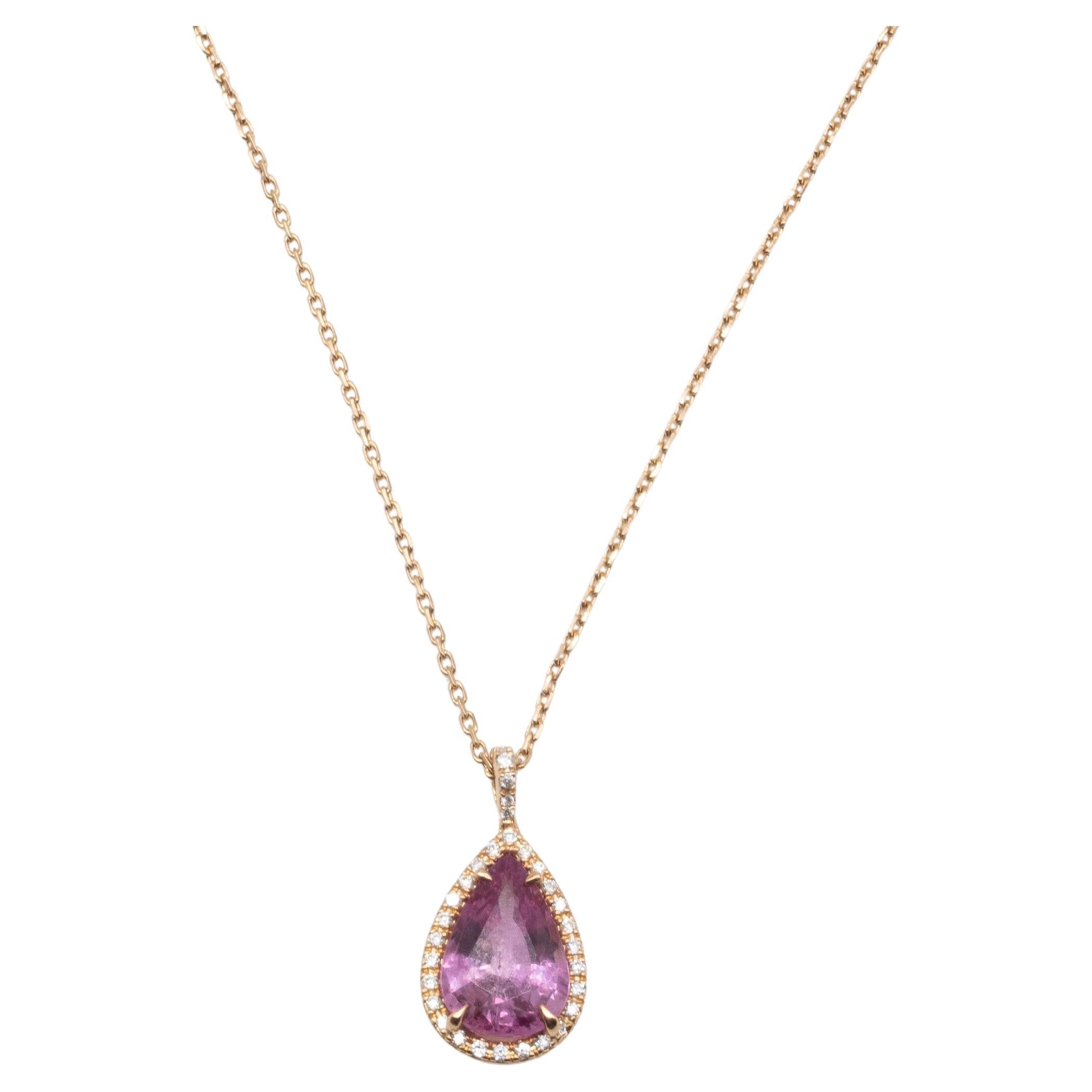 Discover timeless elegance embodied in our 18kt Rose Gold Pendant Necklace adorned with sparkling Pink Sapphire and glittering diamonds.

The pendant features a brilliant Pink Sapphire in the center, symbolizing love and passion, surrounded by