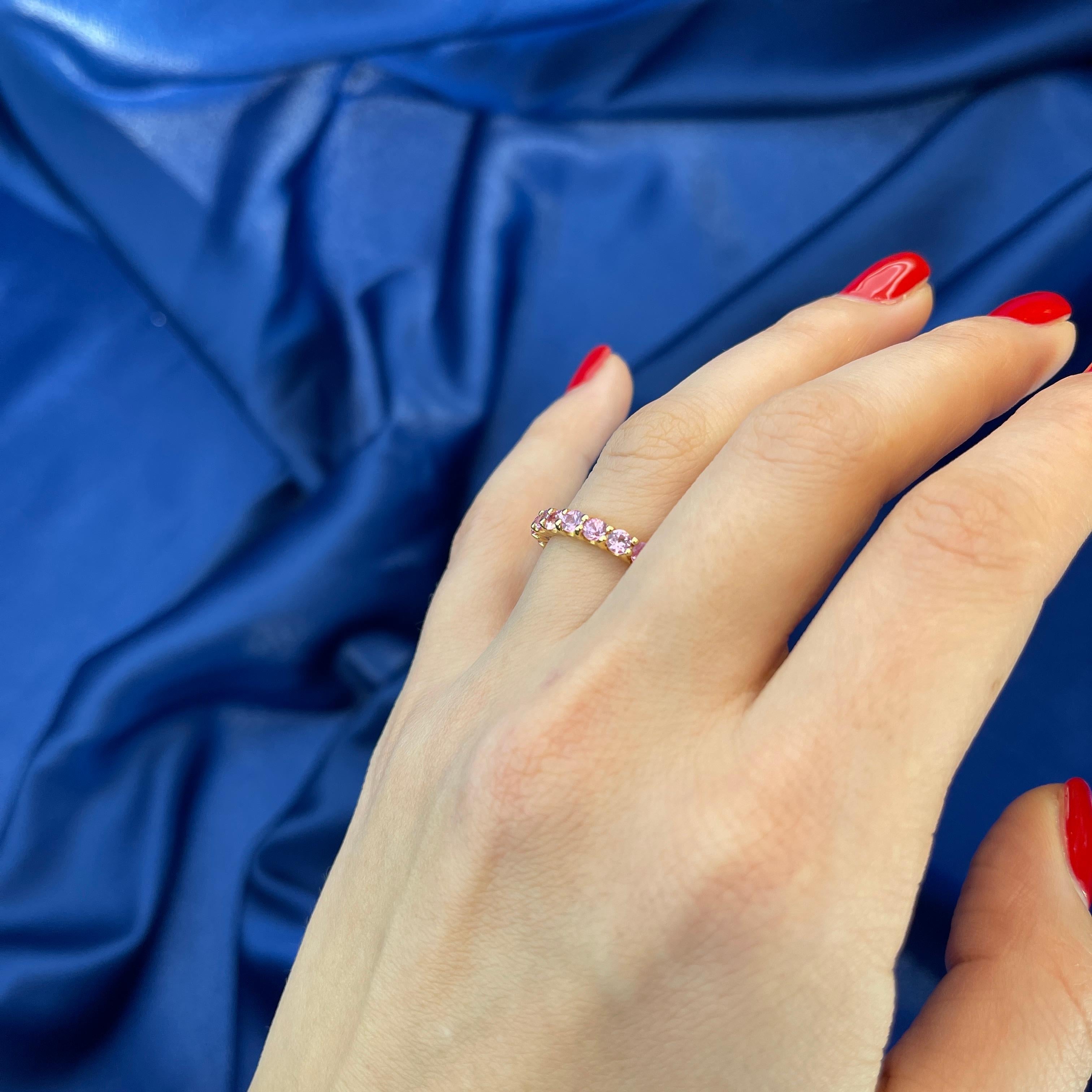 Women's or Men's 18K Rose Gold Pink Sapphire Eternity Band Ring For Sale