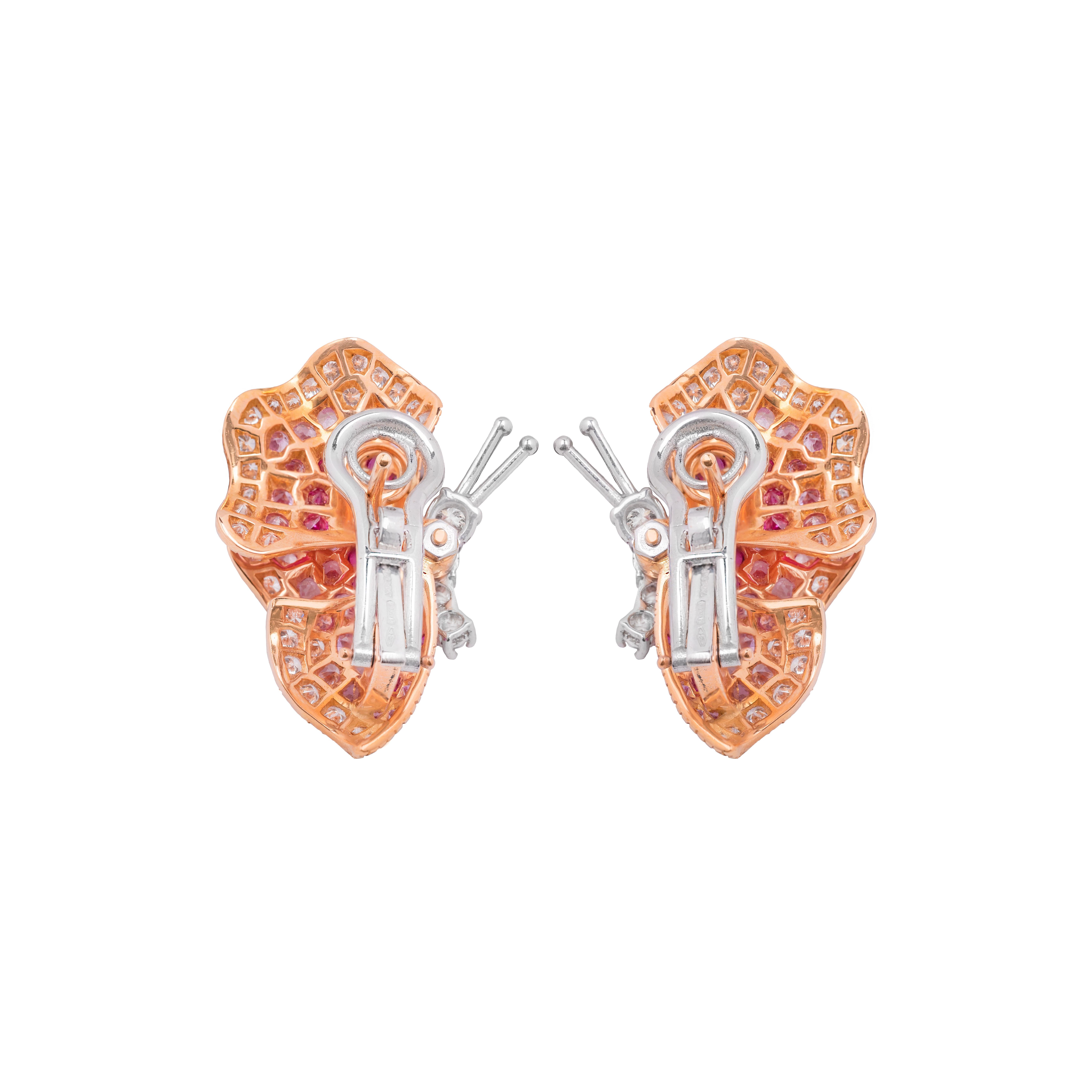 These bright earrings are made in Italy by Fanuele Gioielli. 
Each 18k rose gold earrings features four brilliant cut white diamonds as body, the wings instead are covered by brilliant cut pink sapphires with shades from light pink to dark pink and