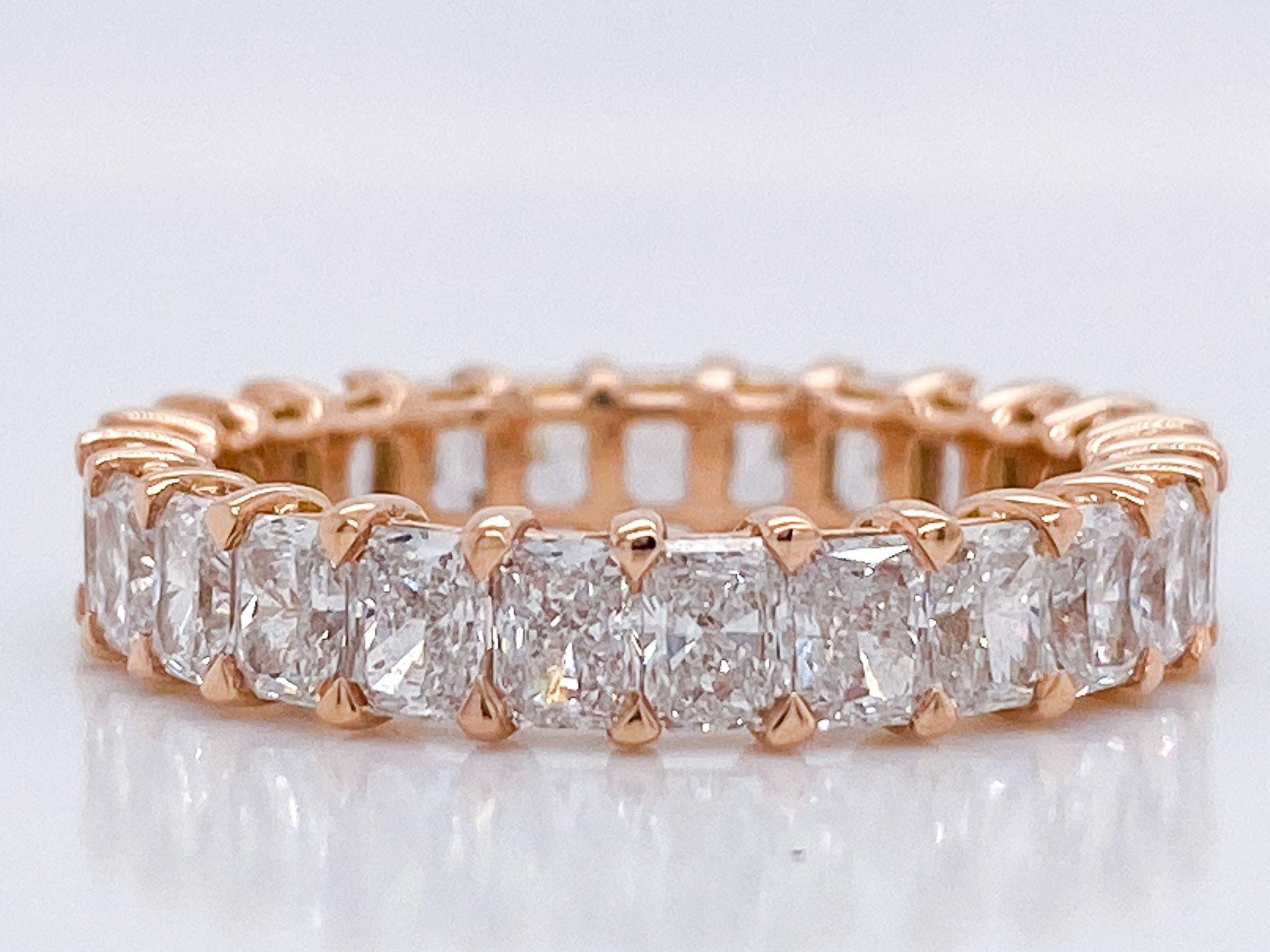 Imagine the look on her face when she sees this Radiant Diamond Eternity Band; featuring 25 Radiant Diamonds, nd weighing 3.58 Total Carat Weight. These diamonds are F Color, VS Clarity, and are set in a 18K Rose Gold setting in a finger size 6.25.