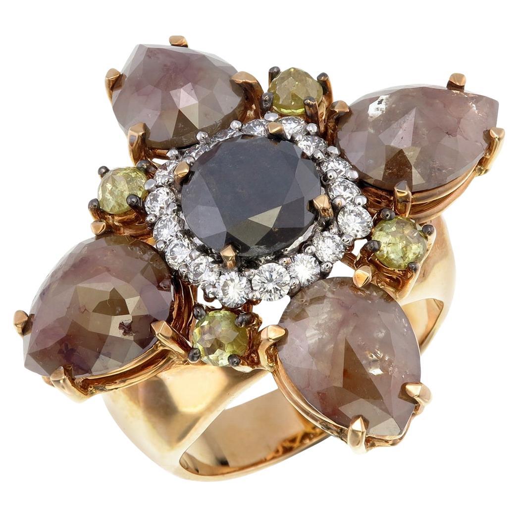 Anello in oro rosa 18 carati con diamante nero al centro e diamanti taglio pera misti