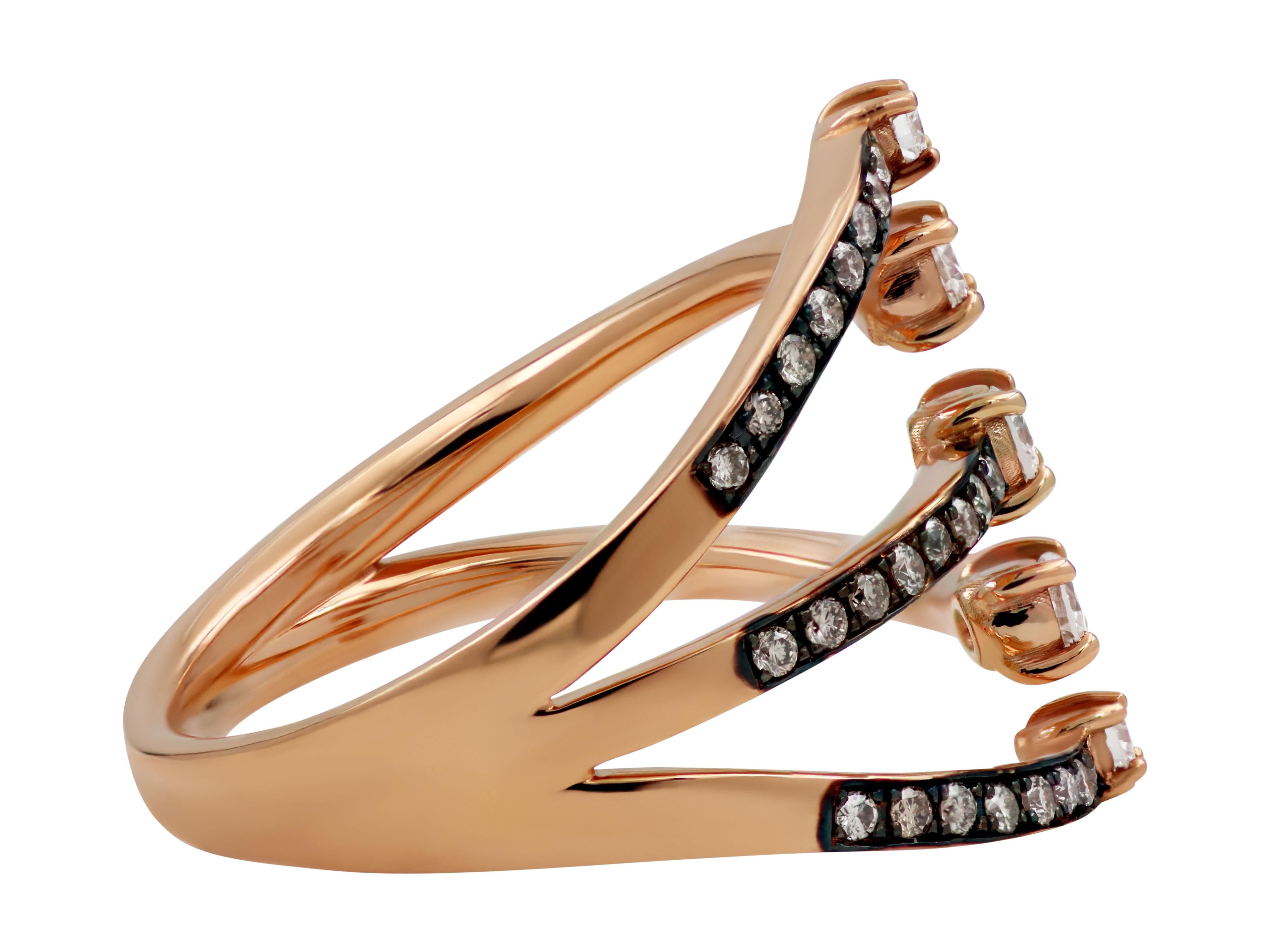 Modern ring in 18k rose gold with five brilliant cut diamonds total 0.54 carats.

Width: 0.708”, 1.8cm