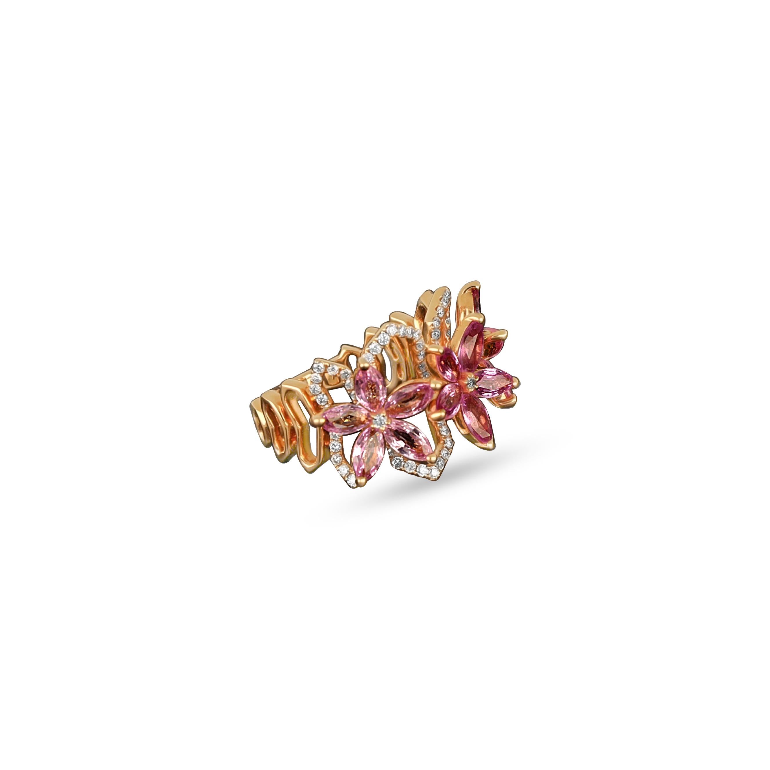 Step into a world of timeless romance with this enchanting rose gold ring, a breathtaking union of delicate beauty and enduring elegance. Created in the warm embrace of rose gold, the band itself becomes a canvas for a blooming garden of ethereal