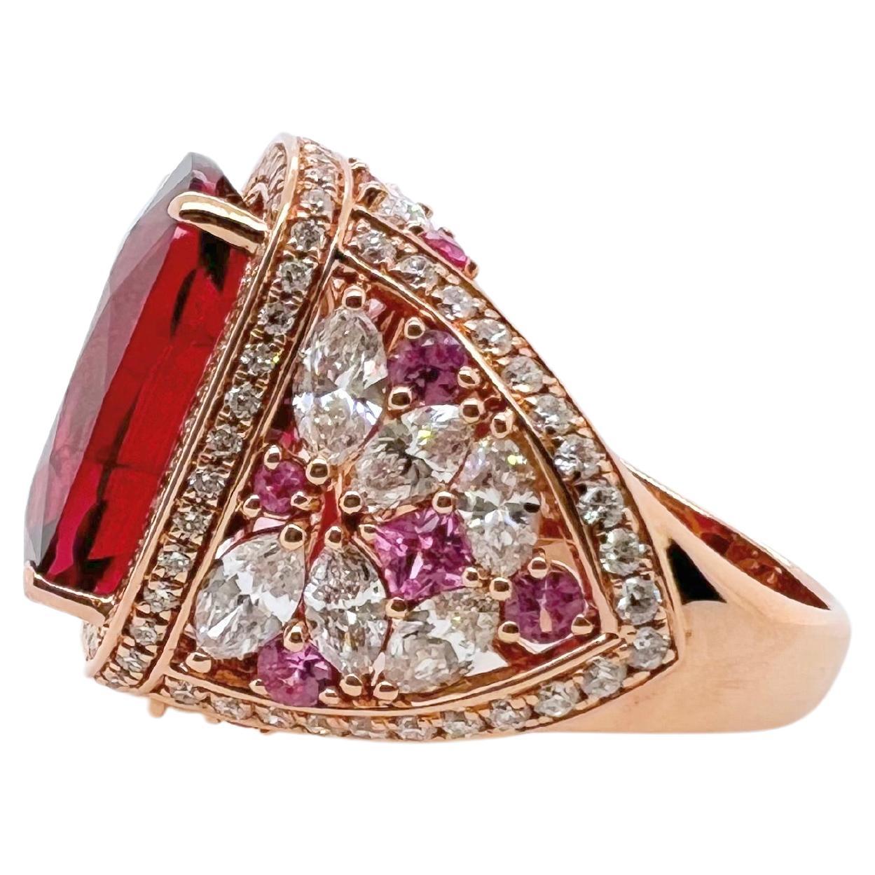 This beautiful ring has so many intricate details that will make you in awe! The rubellite is gem quality with absolutely amazing color and brilliance. The raspberry red is bold and vibrant that captivates the eyes. The setting has beautiful marquis