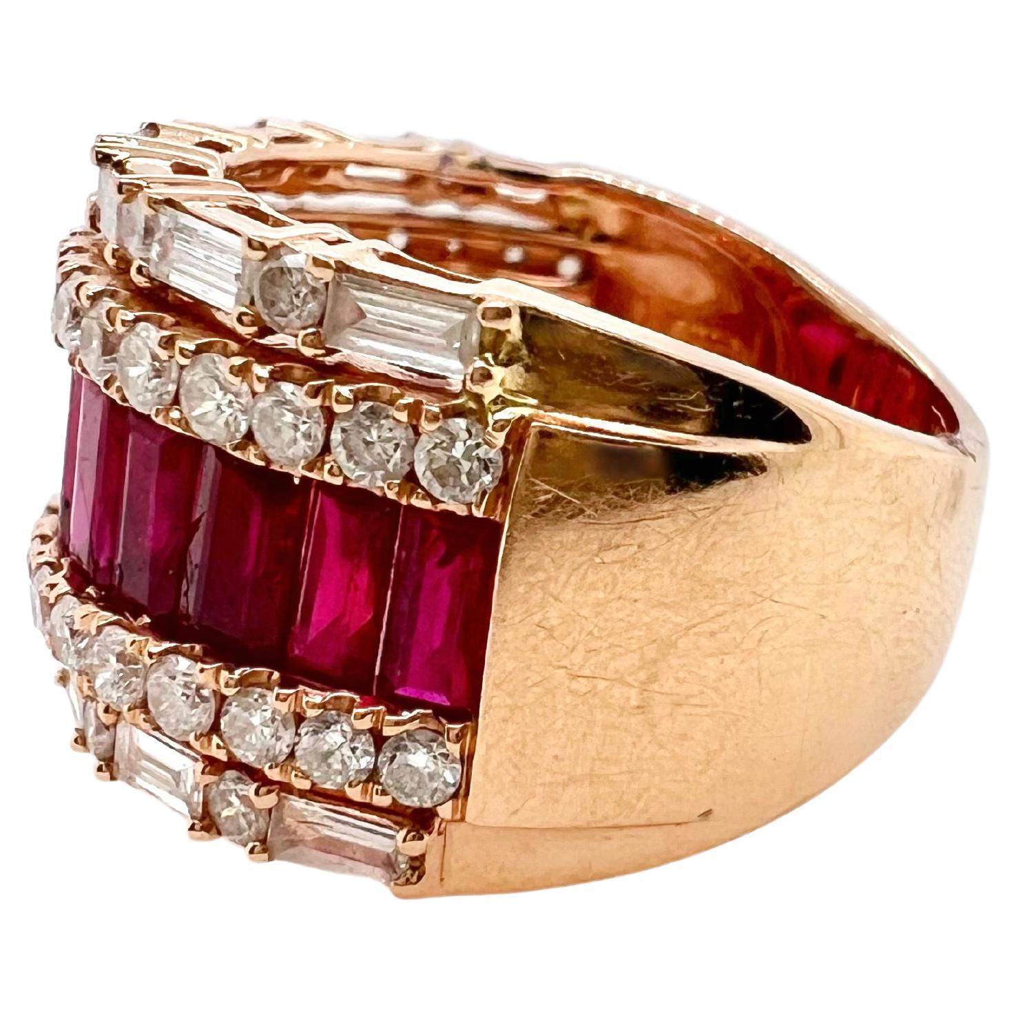 This is an exquisite ruby and diamond band that will go with any outfits.  It's the perfect smart casual band with the channel set ruby baguettes in the the middle with round and baguette diamonds on the shoulders.

Size: 6.25 (can be resize)
Ruby: