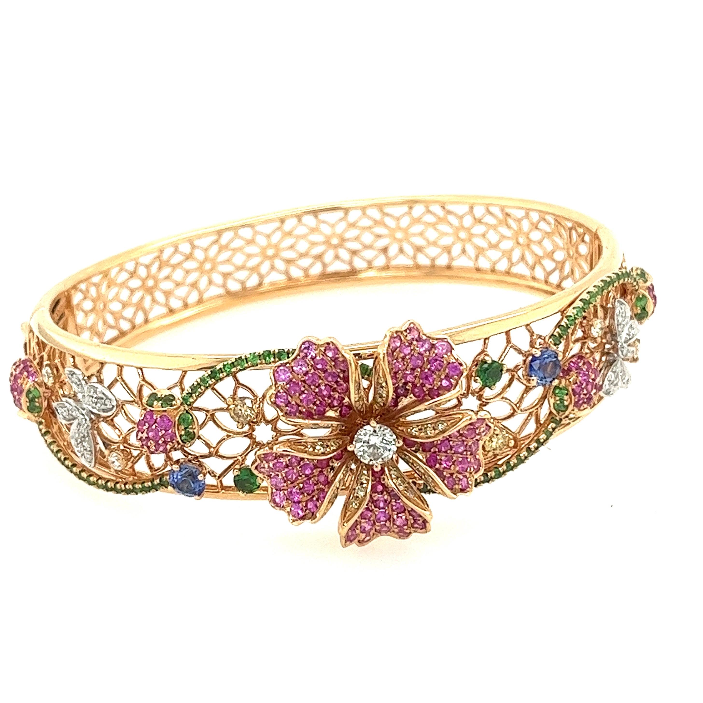 18K Rose Gold Ruby/Pink Sapphire Garden Collection Bracelet with Diamonds

2 Blue Sapphires - 0.40 CT
32 Diamonds - 0.14 CT
37 Diamonds - 0.52 CT
82 Green Garnets - 0.86 CT
125 Pink Sapphires - 1.38 CT
30 Rubies - 0.28 CT
18K Rose Gold - 25.15 GM

A