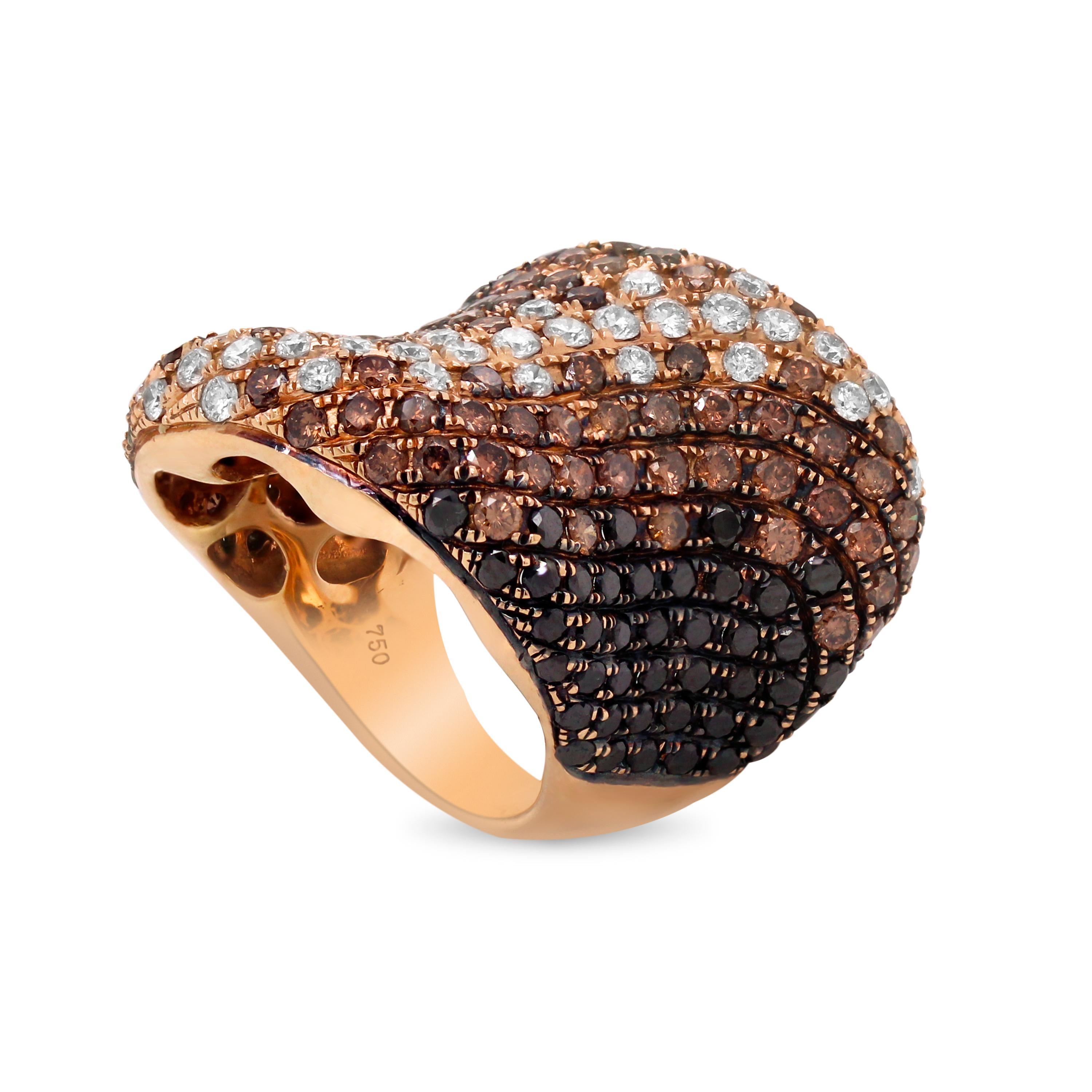 18K Rose Gold Shaded White Brown Black Diamond Curved Cocktail Ring

Apprx. 6.80 carat diamonds total weight. The ring begins with black diamonds that shade closer to brown with white diamonds in the center. The white diamonds are G color, VS