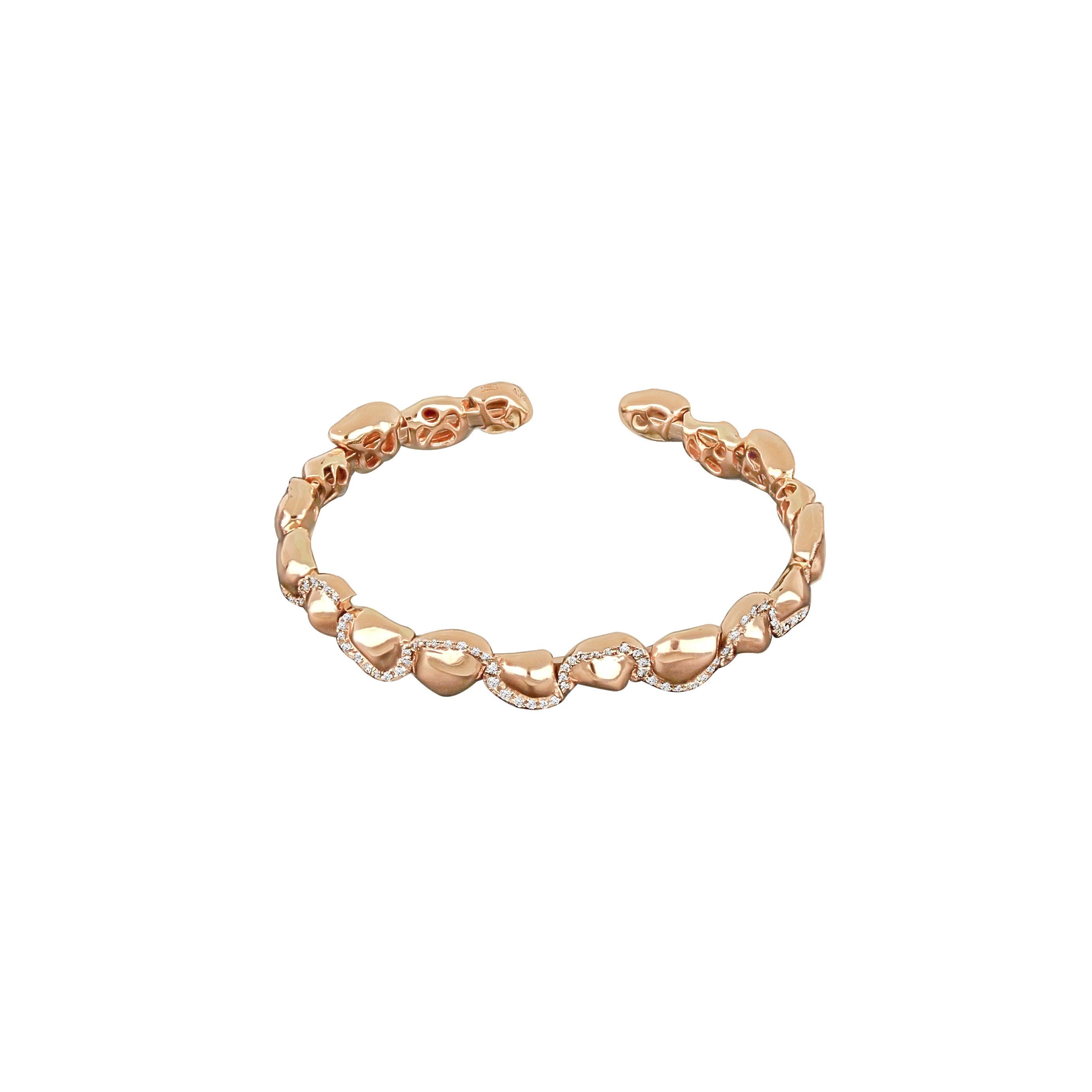 Sarab Collection Bangle takes its shape from the patterns and marking of the desert. Interlacing the finest round cut diamonds and rose gold nuggets to create an echo of the many stories of resilient women of the desert.

-	Weight: 20.86 g