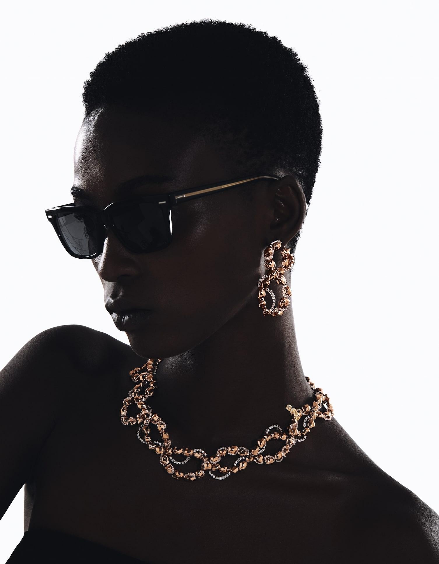 Sarab Collection Statement Necklace takes its shape from the patterns and marking of the desert. Interlacing the finest round cut diamonds and rose gold shiny and matte nuggets to create an echo of the many stories of resilient women of the