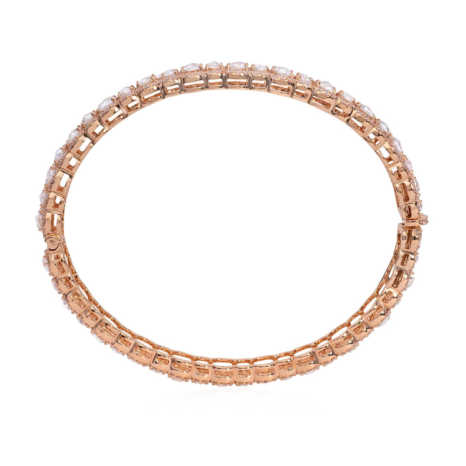 The tennis bracelet is a classic and timeless piece of jewelry that exudes elegance and sophistication. This particular bracelet is crafted from 18k rose gold, a lustrous and durable precious metal known for its rich hue.

The bracelet is adorned