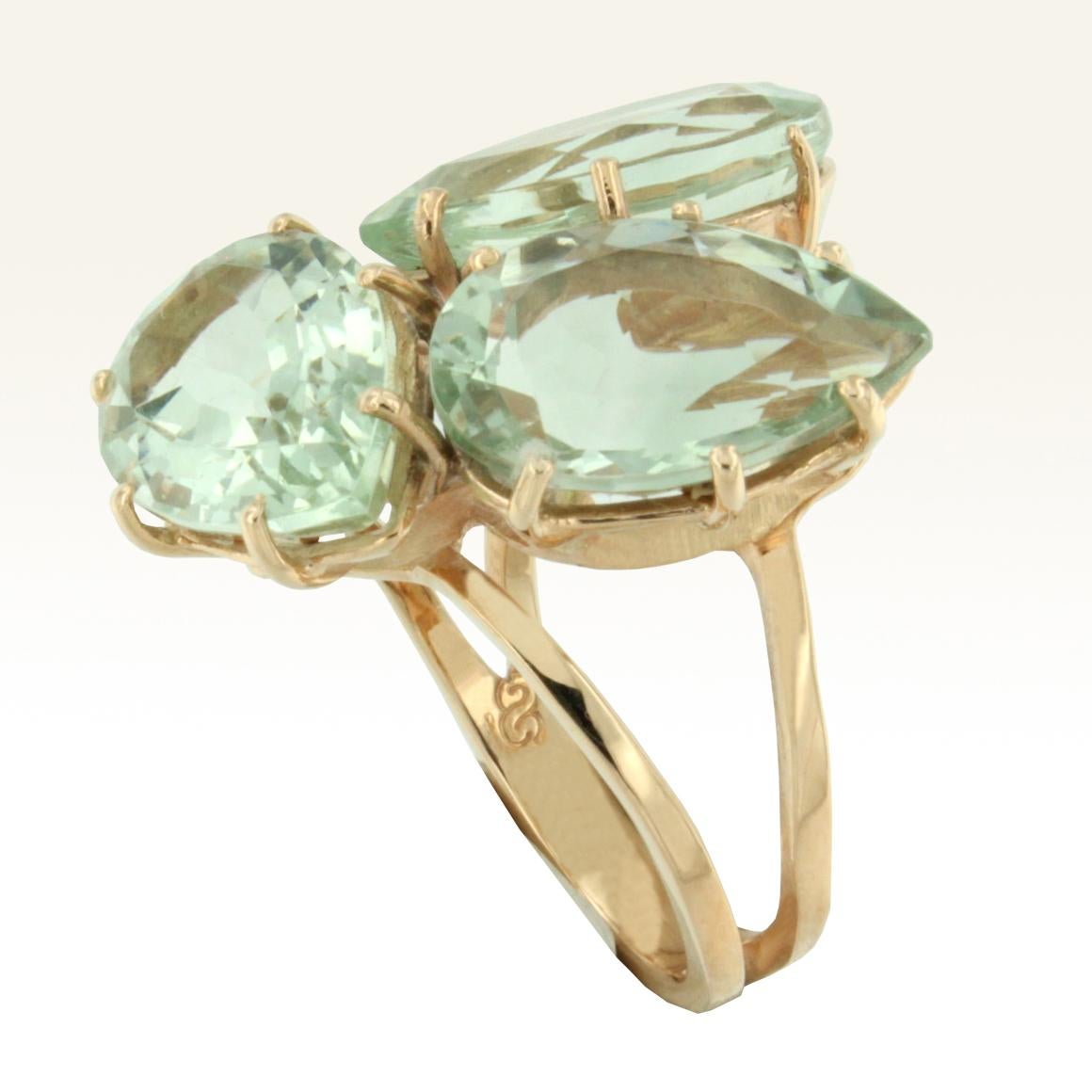 Ring 18k rose gold with Green Amethyst (drop cut, size:10x14 mm) Size of Ring EU 13  USA 7
Three intertwining drops create a unique light for this ring, the green colour has relaxing ecffet and promotes calm , it represents the sence of justice .