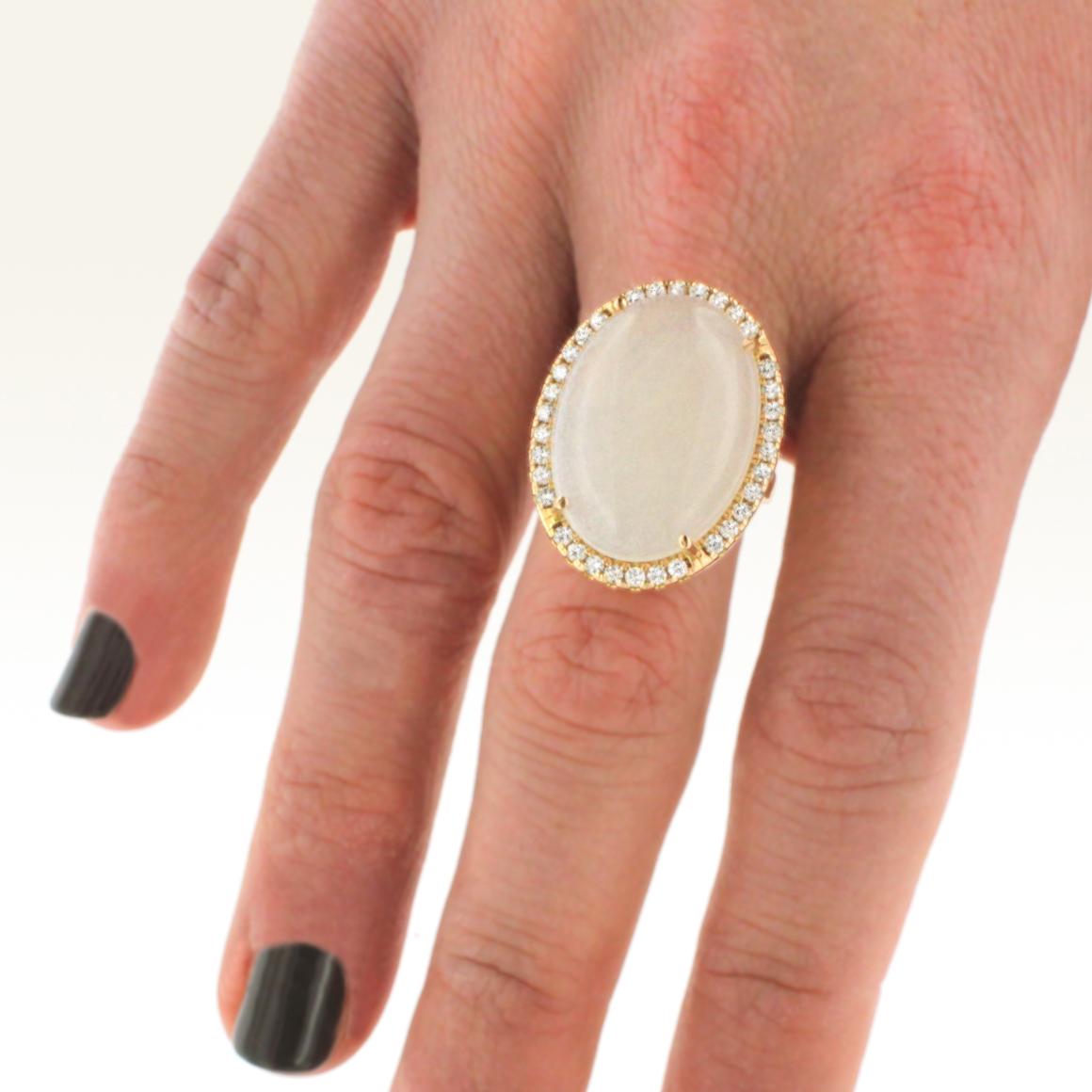 Ring 18 karat rose gold with cabochon oval white Moonstone (size: 16x22 mm) and white diamond Karats 0,55  
Very elegant Ring by Stanoppi Jewellery , Made in Italy 
The Moonstone creates serenity and carelessness.The iridescent white color creates a