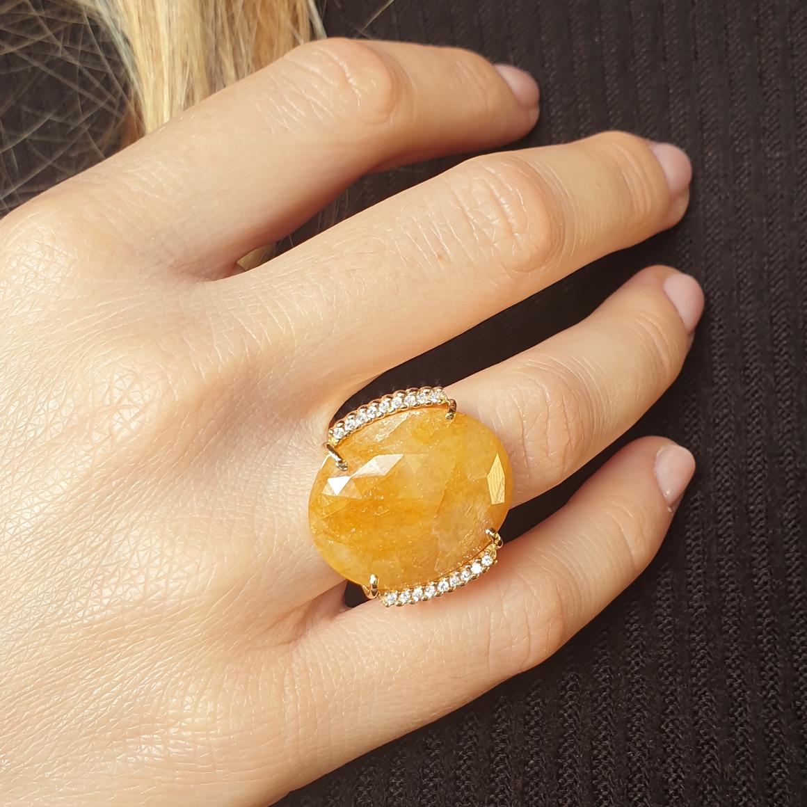 Amazing Cocktail ring , Intense yellow sapphire, very nice and particular design . Made in Italy by Stanoppi Jewellery since 1948.

Ring in 18k rose gold with yellow Sapphire (oval cut, size: 18x24 mm cts 12.80) and white Diamonds cts 0.18 VS colour