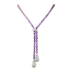 Collar tipo lazo de oro rosa y blanco de 18 quilates con 0,50 ct de diamantes y cuarzo amatista MF05-070825