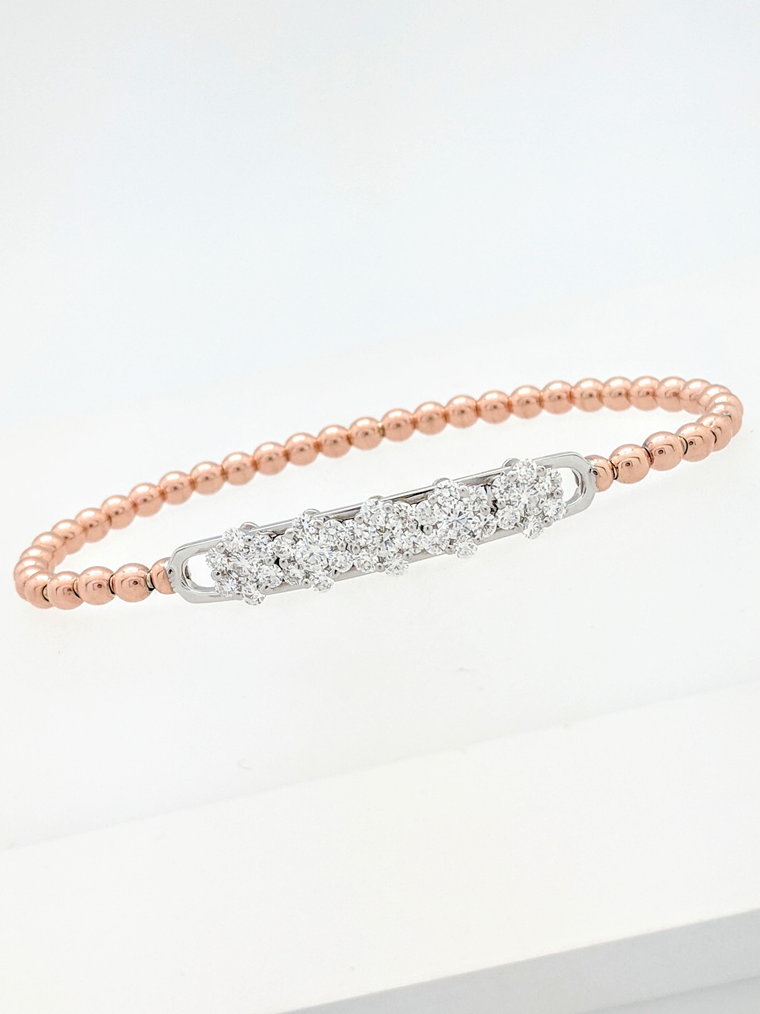 18k Rose & White Gold 1.41ctw Floating Diamond Stretchable Beaded Bracelet

You are viewing a Beautiful Floating Diamond Stretchable Beaded Bracelet that is sure to make a statement!

The bracelet is crafted from 18k rose and white gold and weighs