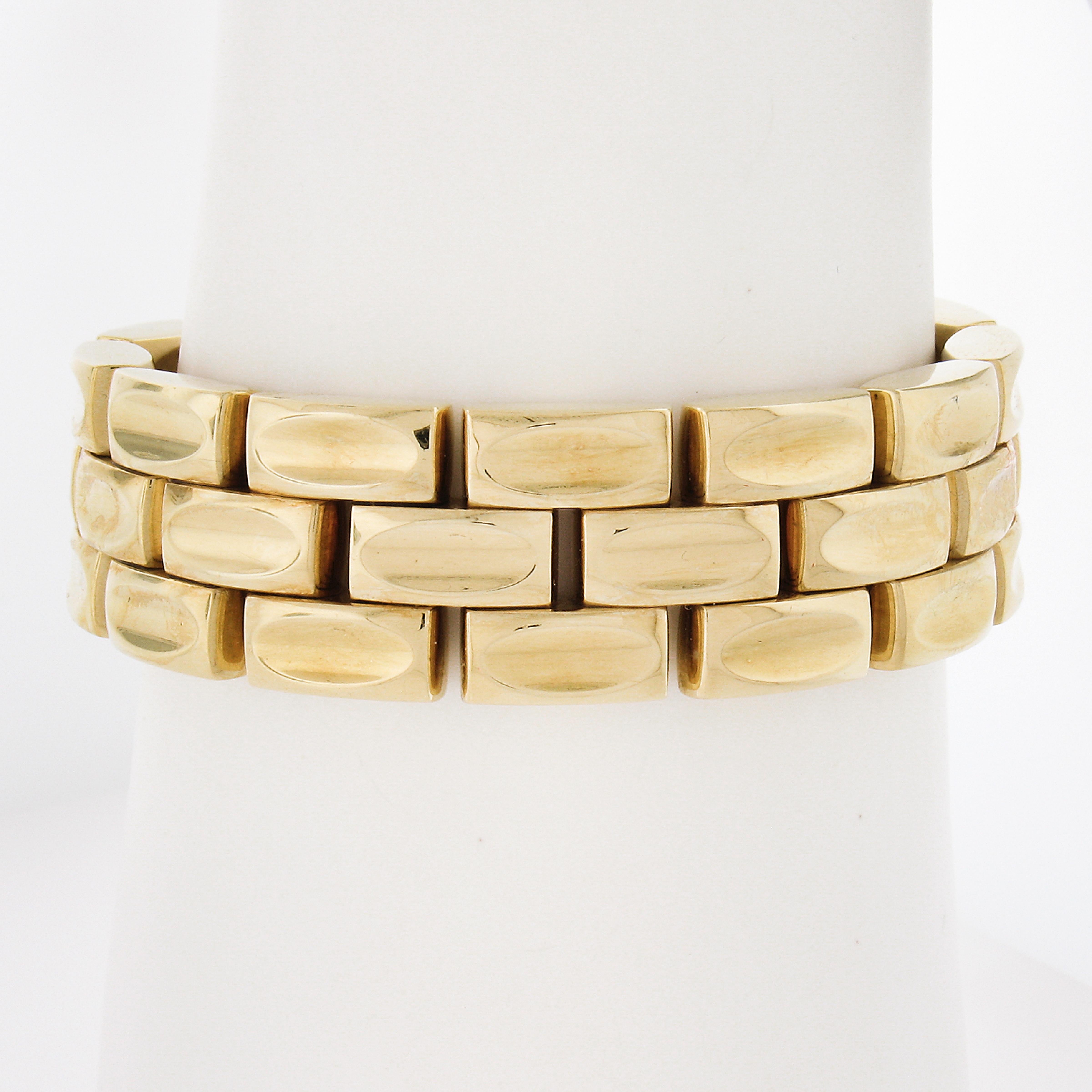 Here we have a work of art plain gold bracelet! This reversible bracelet features a polished all gold side and a dual brushed and polished yellow gold and rose gold center side. The clasp flips upward and turns to create seamless reversible wear.