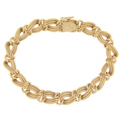 18k Rosy Yellow Gold 7" 9.4mm Wide Textured Interlocking Link Bracelet