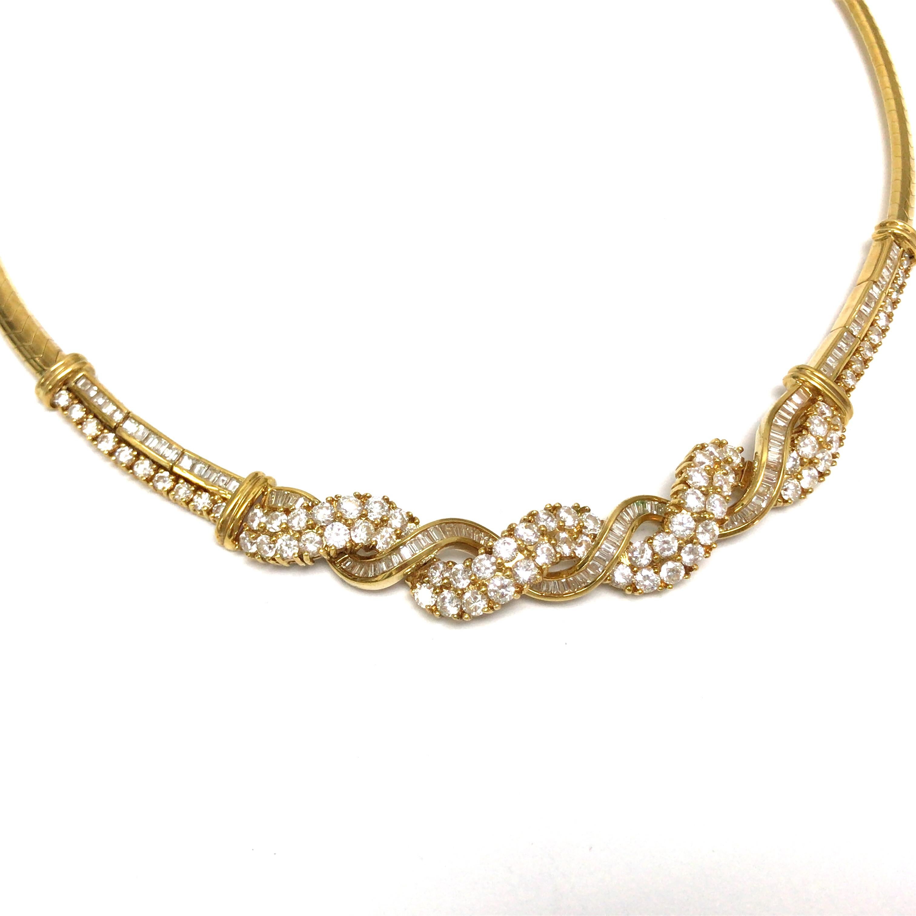 Round and Baguette Diamond Twist Necklace in 18K Yellow Gold.  Round Brilliant Cut and Baguette Diamonds weighing 8.50 carat total weight, G-H in color and VS-SI in clarity.  The Necklace measures 16 inch in length and 1/2 inch in width.   42.76
