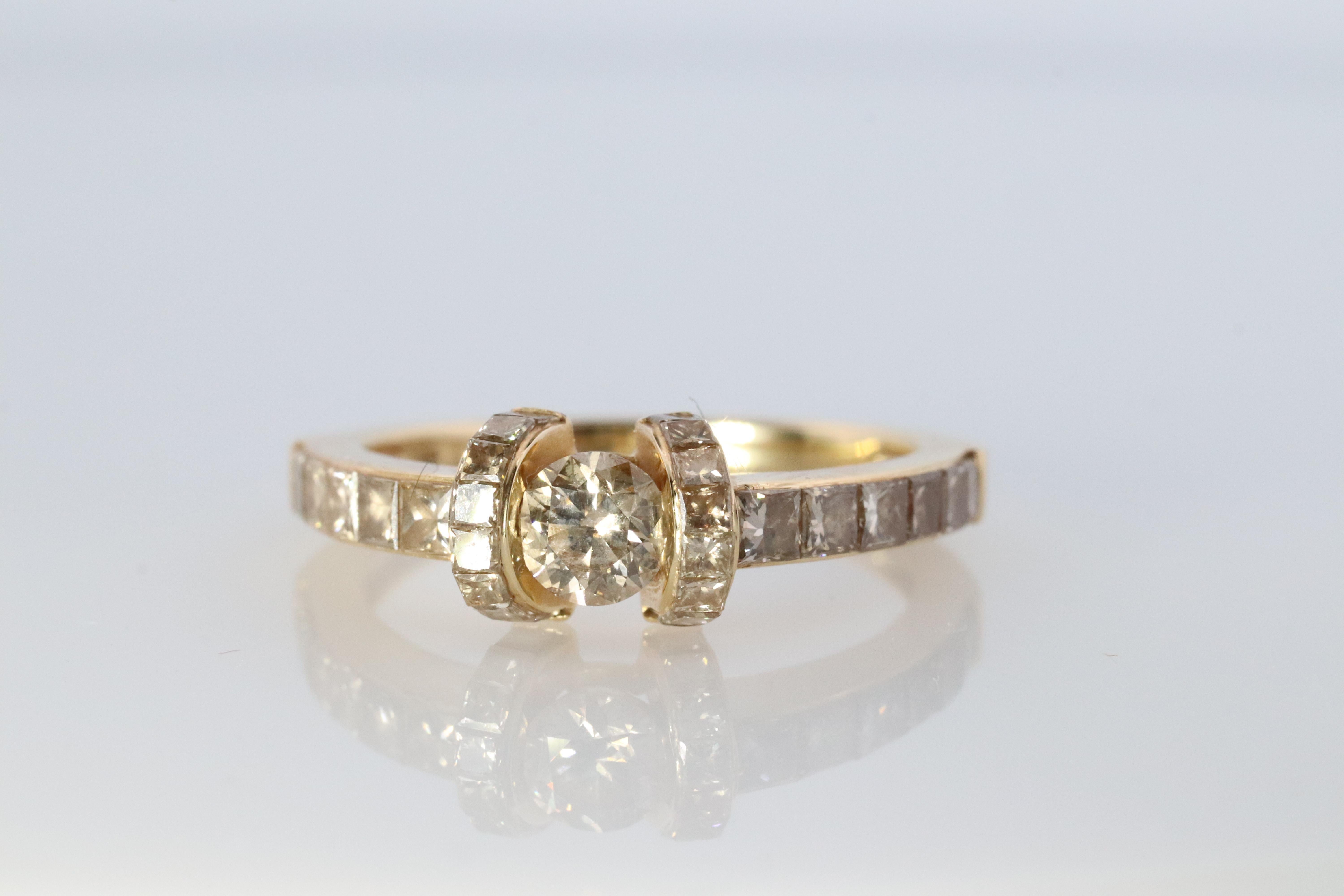 Stunning  ring or a wedding band. 

High Quality Brilliant Diamond solitaire tension set with princess accents illusion set.

Condition: No visible signs of wear.

Details:
3.2 grams Total weight
1.10 ctw of Diamonds. Diamonds are SI1 clarity with