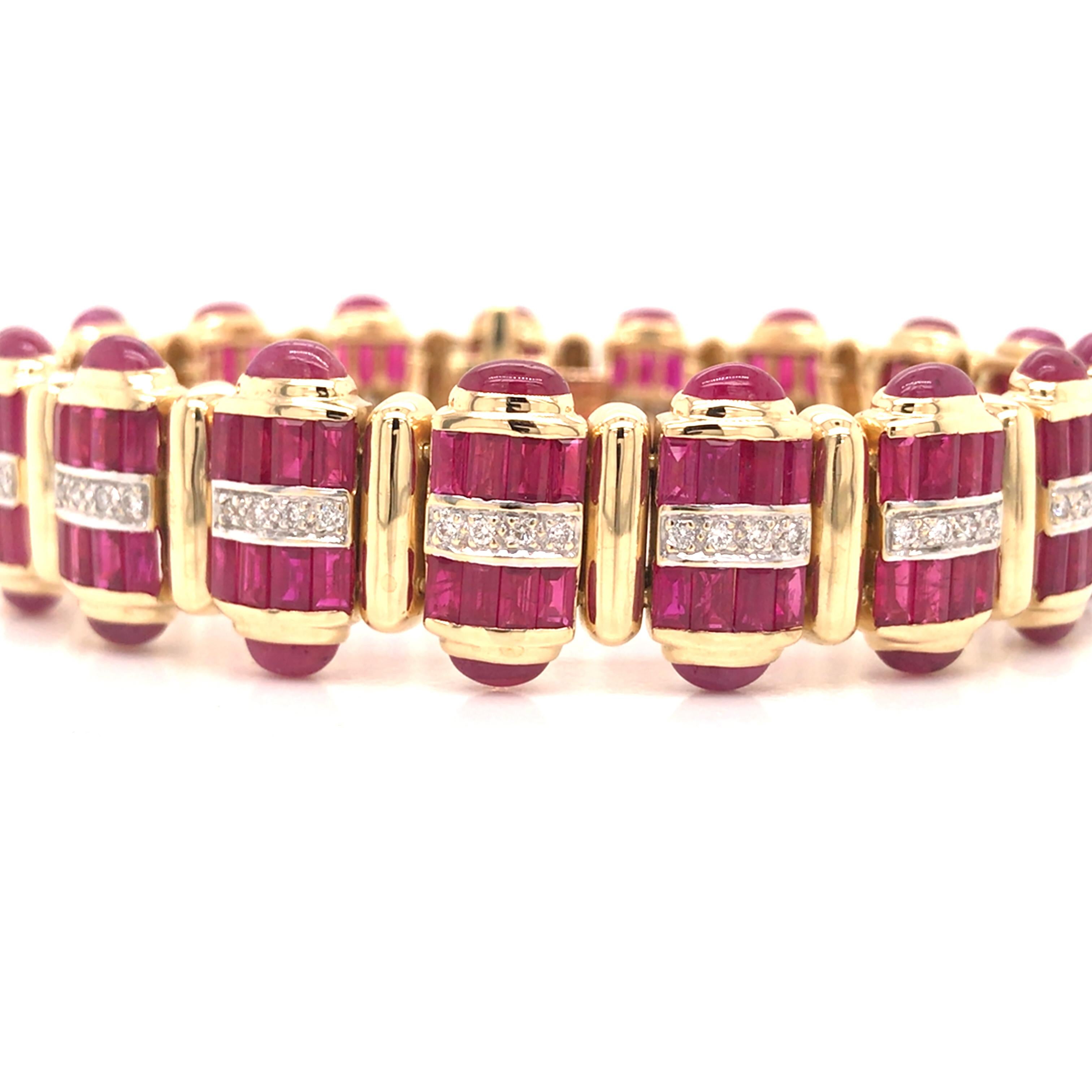 Ruby and Diamond Bracelet in 18K Yellow Gold.  Round Brilliant Cut Diamonds weighing 0.72 carat total weight, G-H in color and VS in clarity are expertly set.  The Bracelet measures 6 1/2 inch in length and 3/8 inch in width.  40.9 grams.