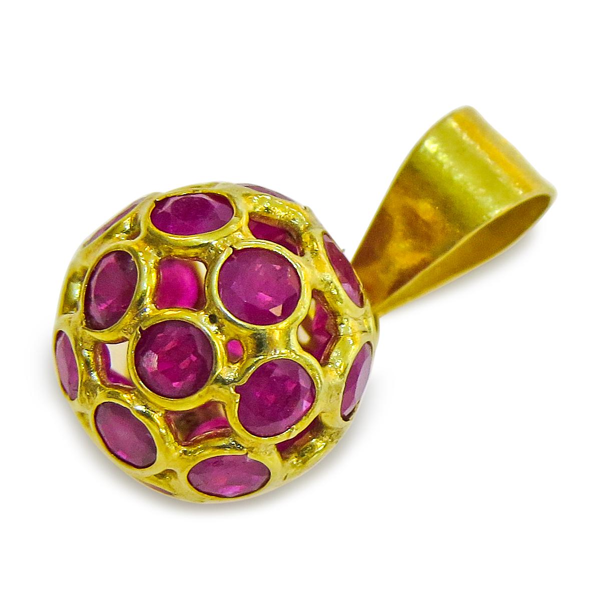 18K Yellow Gold 
Weight= 1gr 
Ruby= 0.72 Ct total
Year= 2000
