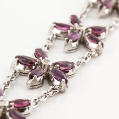 Ruby and Diamond Flower Bracelet in White Gold