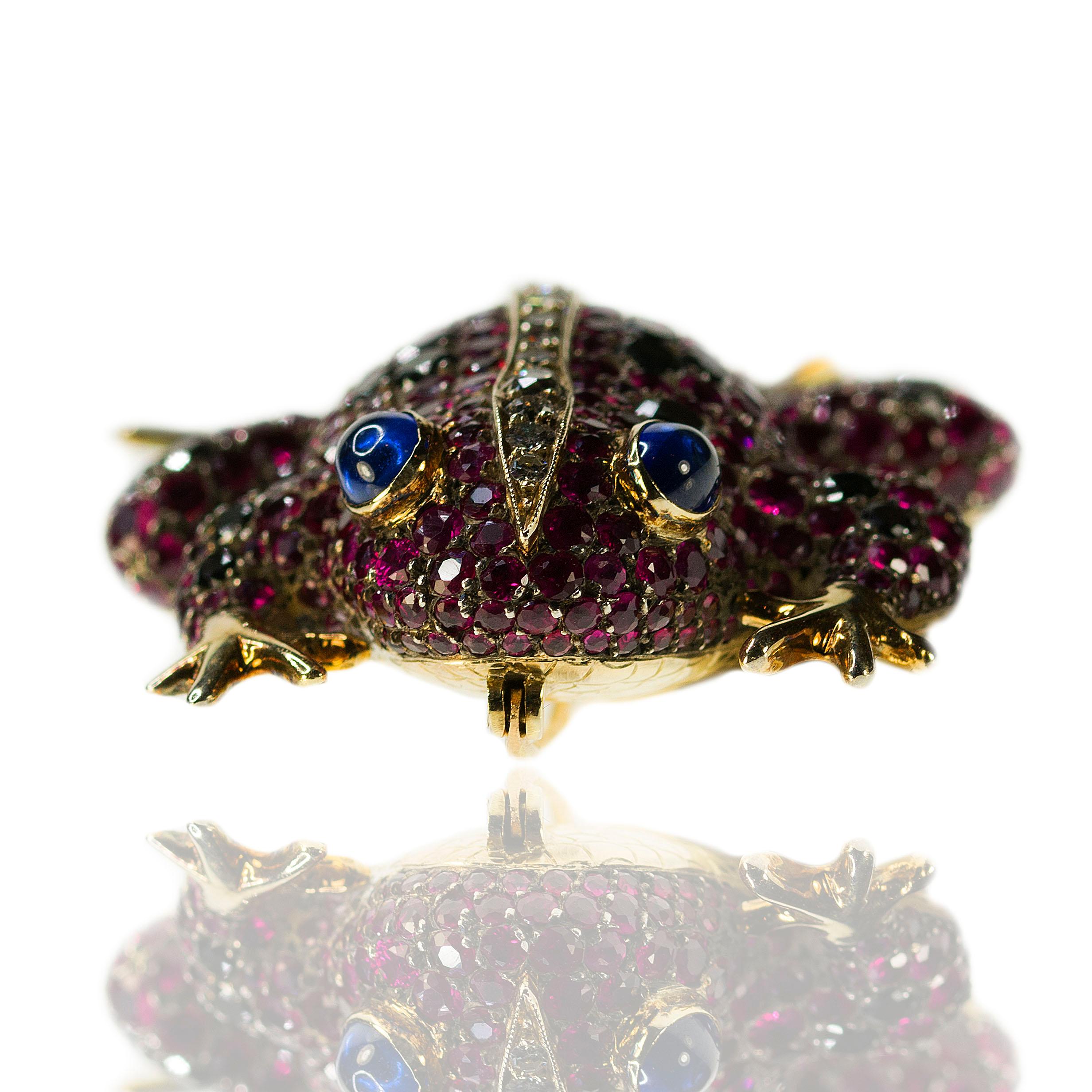 18k Frog brooch with approximately 15.00 carats of Ruby, Diamond & Sapphires 31.93 grams, 2 1/2