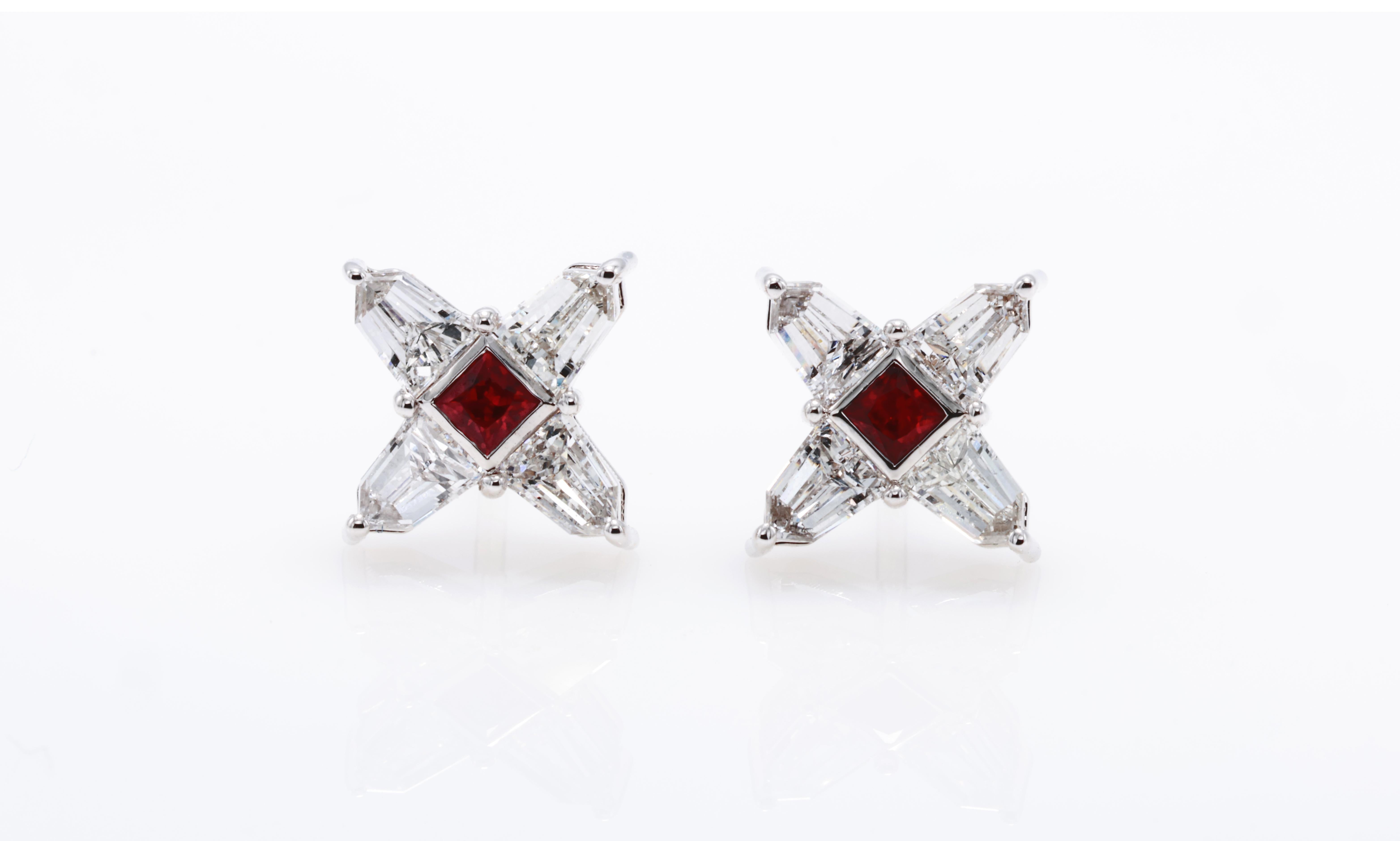 18kt white gold earring with diamonds
  
  Gold colour & karat: White gold 18kt
  Weight: 2.654 grams
  
  Set with-
  Stone type: Ruby
  Shape: square
  Carat: 0.23 (2 Pcs ) 
  Colour: -
  Clarity: -
  
  Surrounding Stones: Diamonds
 1) Side