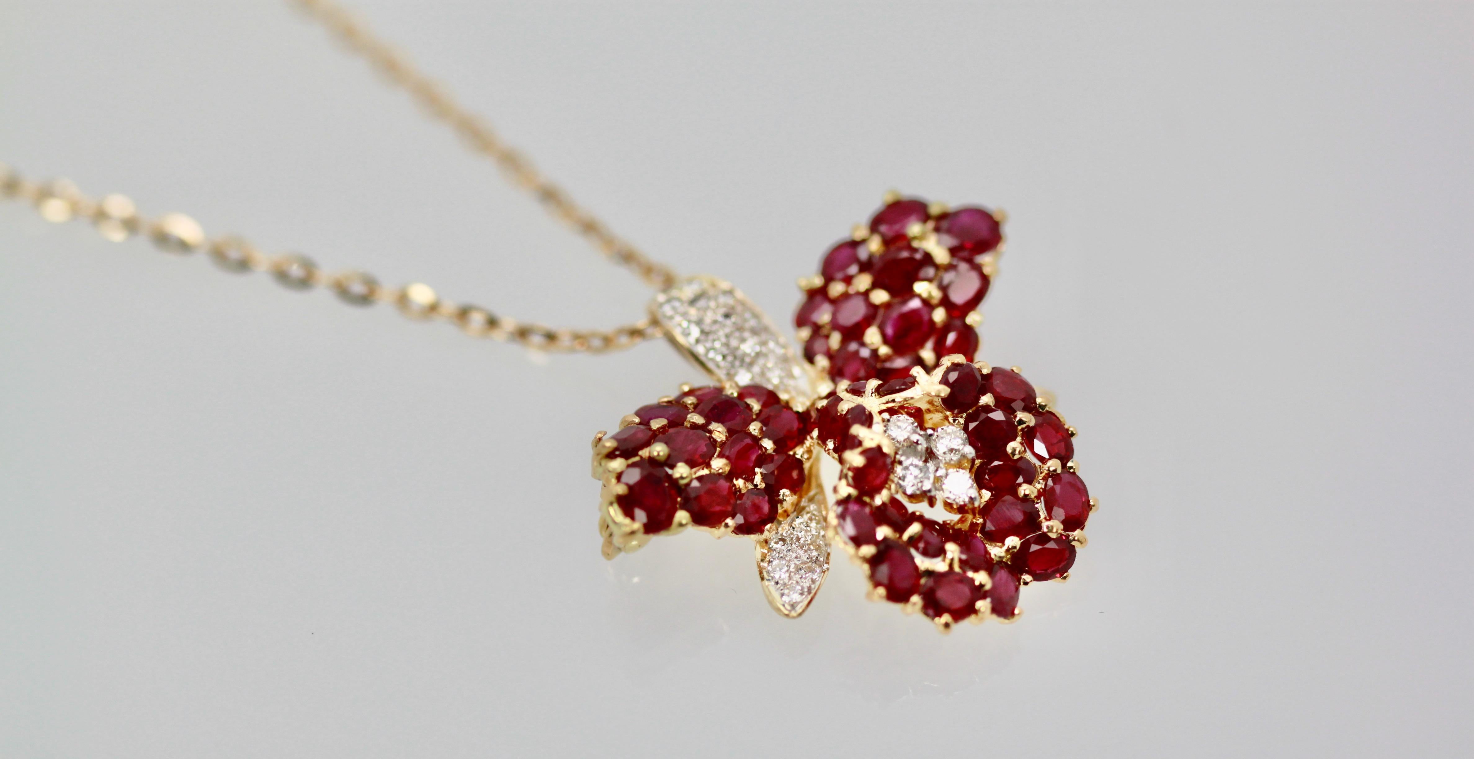 This absolutely beautiful orchid set with 9.00 Carats of Rubies and 0.70 carats of Diamonds G and VS.  This brooch works as a brooch or as a pendant, just add a chain. These Rubies are very red bright and sparkling as are the Diamonds. Simply