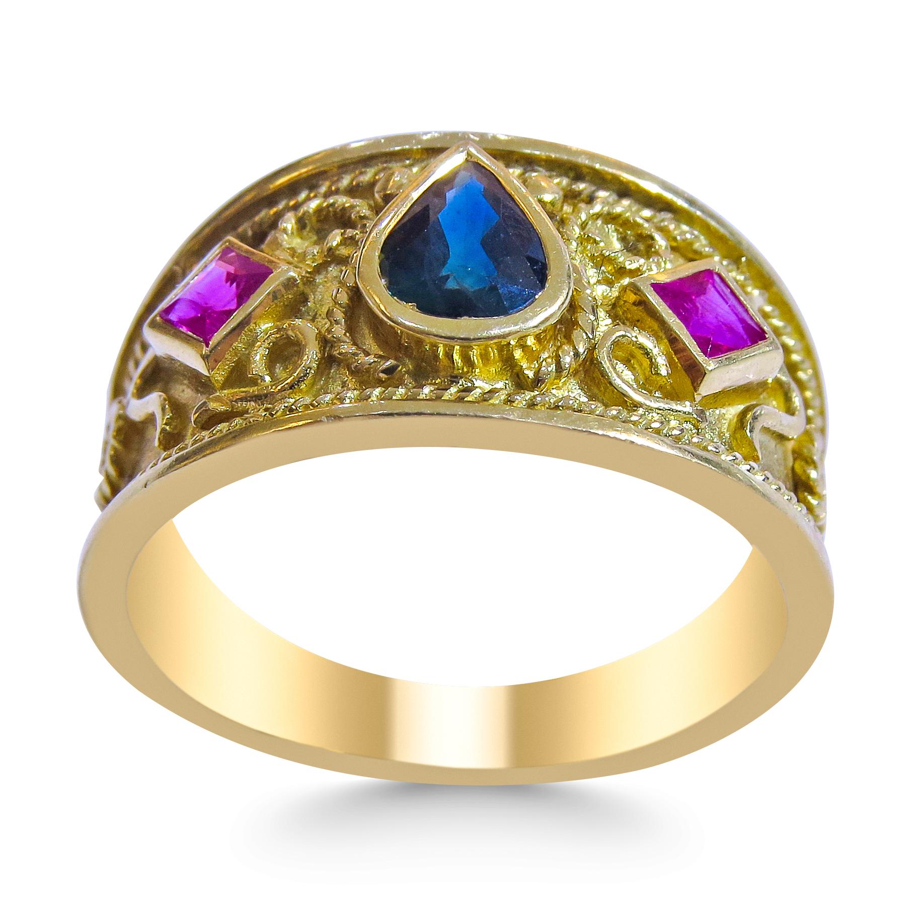 18k Yellow Gold 
Weight= 5.1 gr 
Size= 8 
Sapphire= 0.30 Ct total
Ruby= 0.26 Ct total
Year= 1980