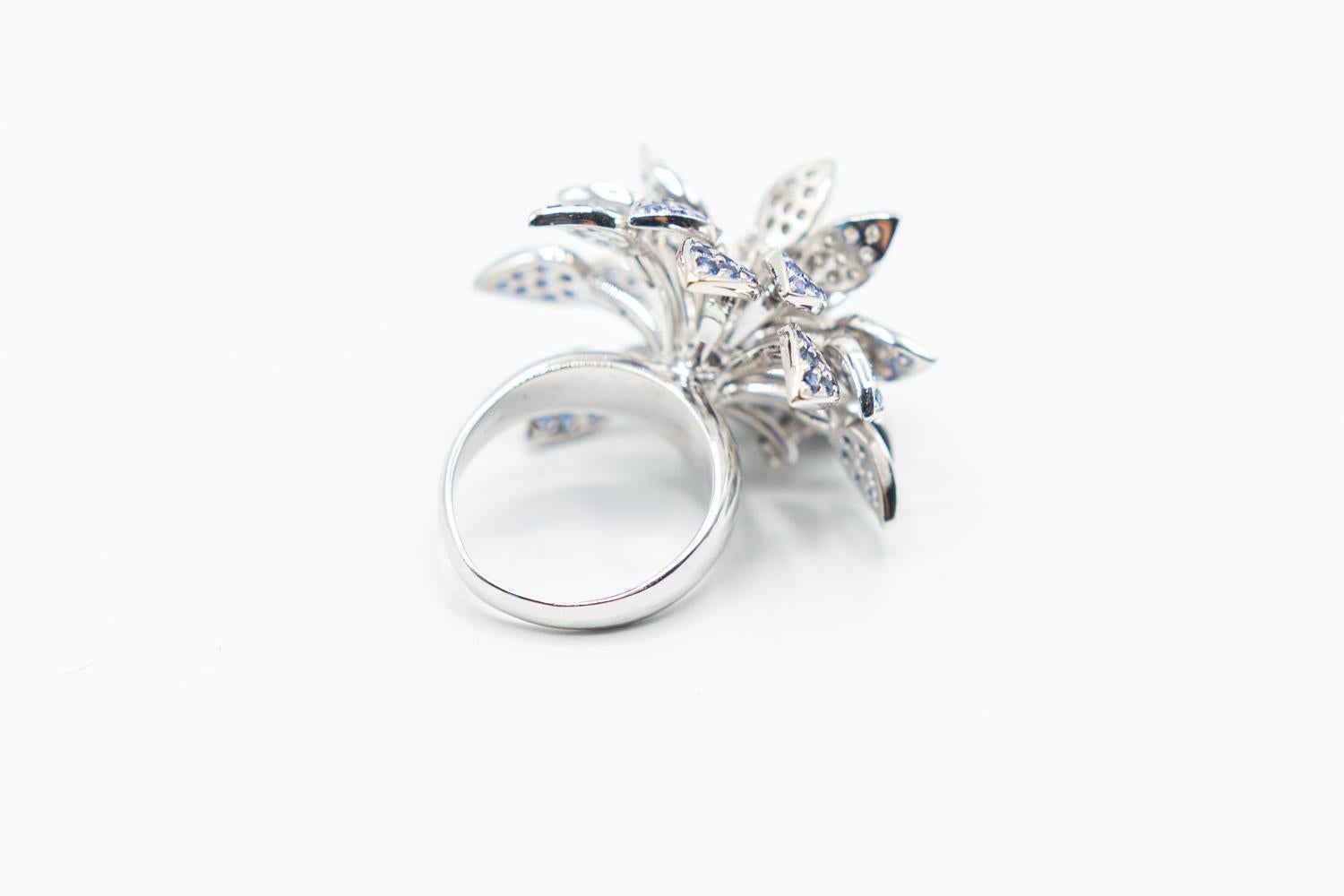 Modern 18 Karat Sapphire and Diamond Floral Mobile Ring/spinner Effy flower ring. For Sale