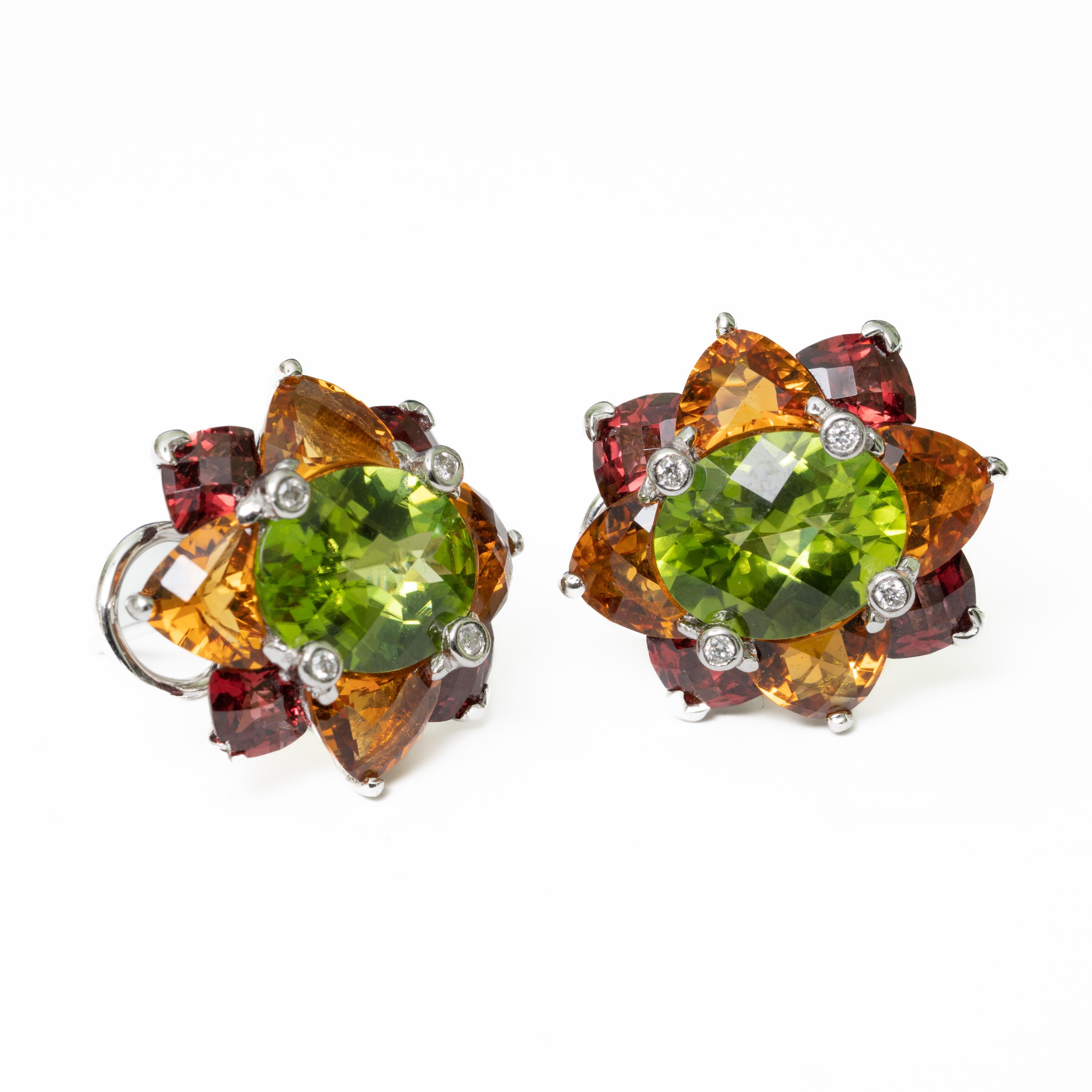 18k Signed Krementz White Gold, Diamond Peridot, Topaz and Citrine Earrings. Peridot Attributes: Oval faceted measuring 10.69 x 8.53 x 5.16mm approx. 3.36 Cts approx. Citrine Attribute: heart shaped faceted 0.33 to .40 Cts each. 1.40 Cts approx.