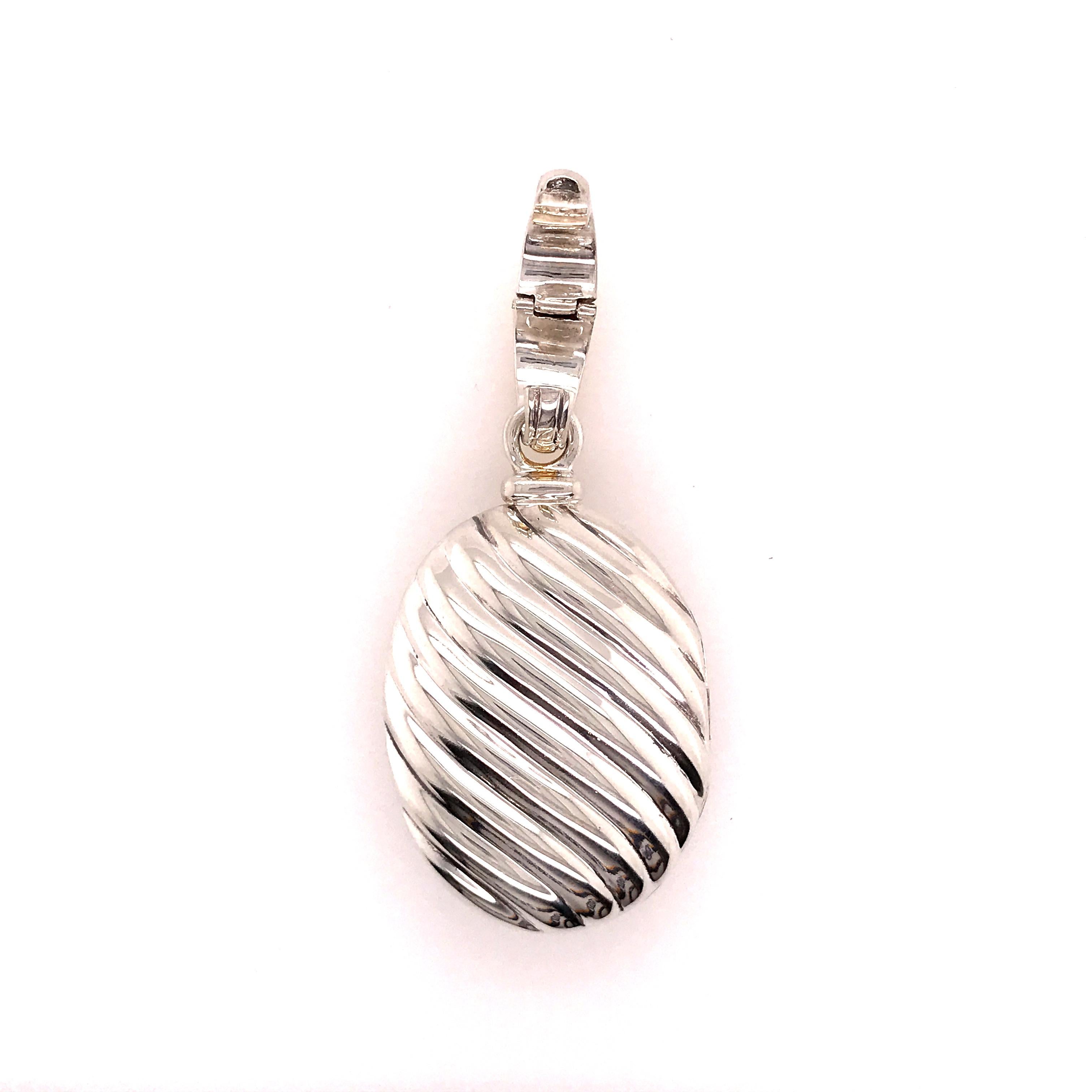 David Yurman Sculpted Cable Pendant Locket in 18K Yellow Gold and Sterling Silver.  The Pendant measures 2 1/2 inches in length, 1 1/8 inches in width and weighs 33.7 grams.  Signed 
