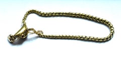 18 Karat Snake Bracelet with Garnet Head, circa 1860