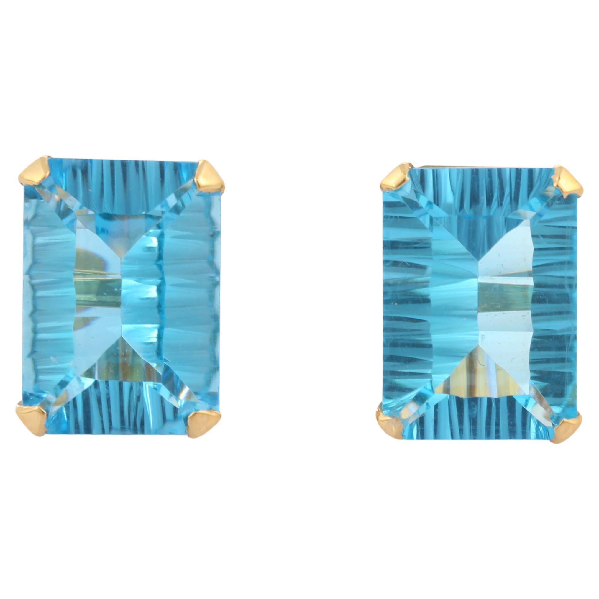 Clous d'oreilles solitaires en or massif 18 carats avec topaze bleue naturelle 14,65 carats