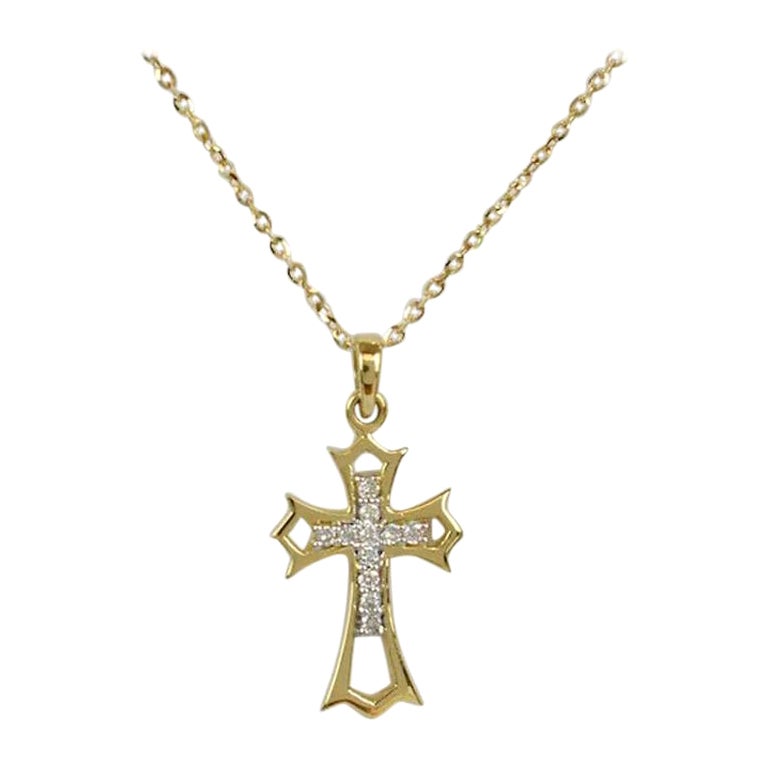 Diamond Cross Necklace in 18k Yellow Gold / White Gold / Rose Gold.

11 round cut diamonds set the shape of the simple and elegant design pendant. The diamonds are very high quality and have a clean and bright fiery sparkly. The gold has a designer