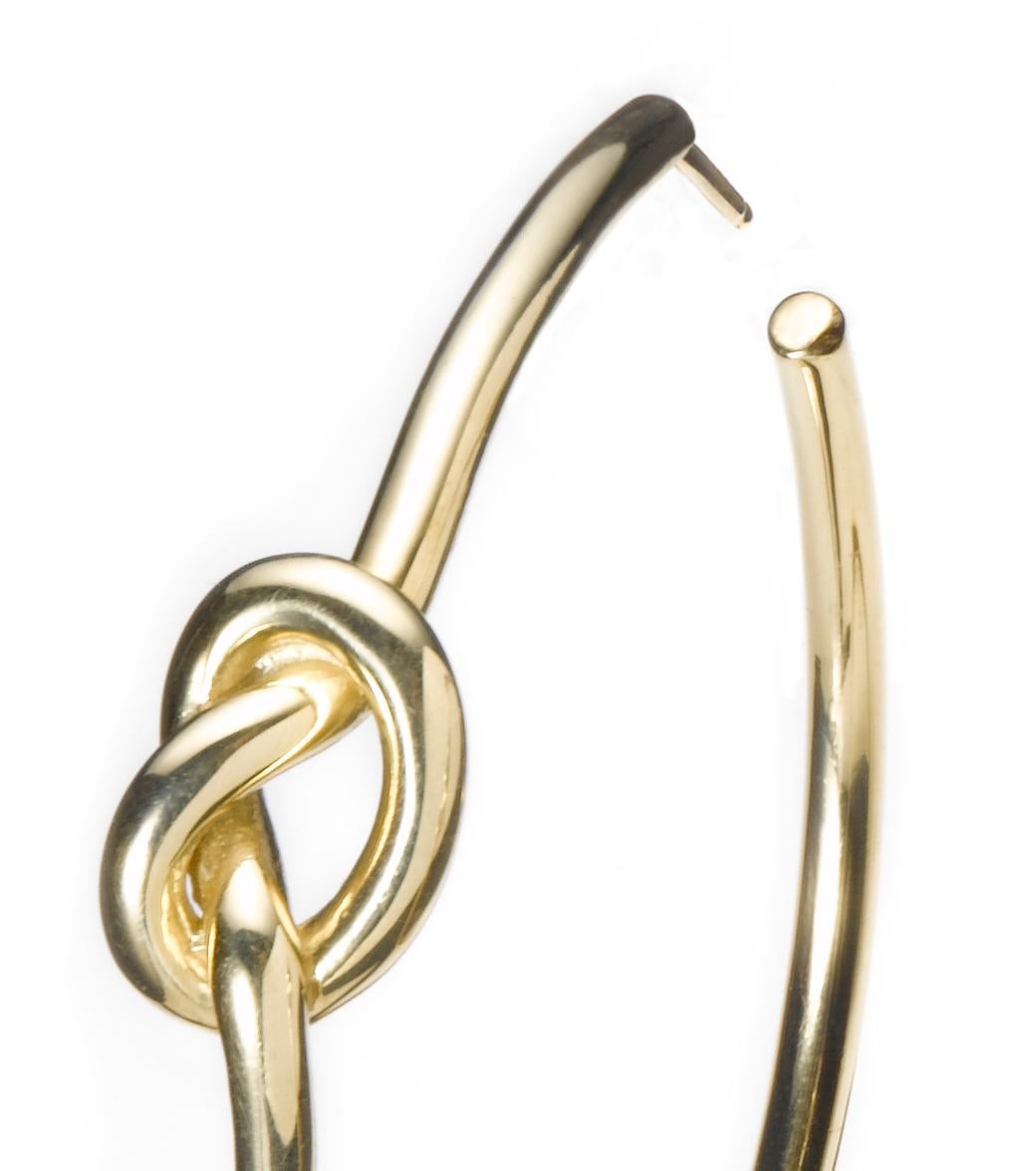 Gorgeous gold hoops with a love knot detail that makes them very special.

solid 18k gold 
1.25
