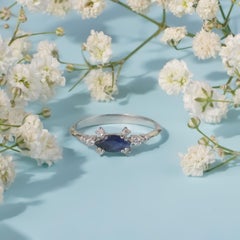 18K solid Gold Night sky blue Sapphire and Diamond ring